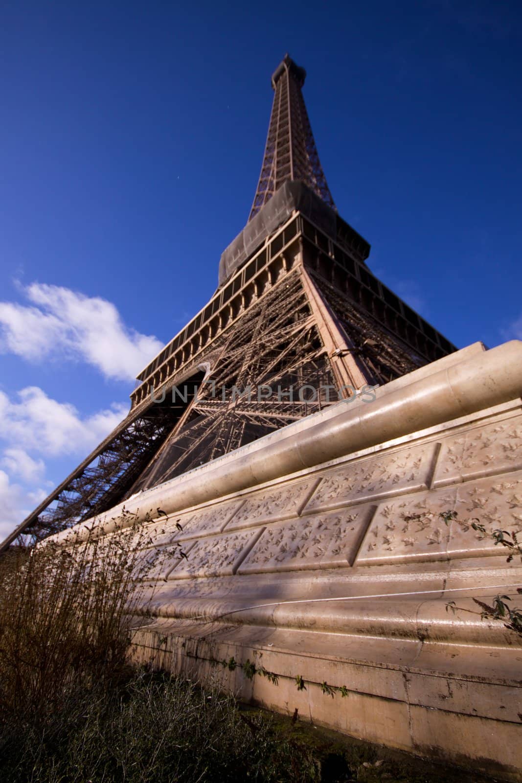 Unusual wide-angle view of Eiffel Tower in Paris