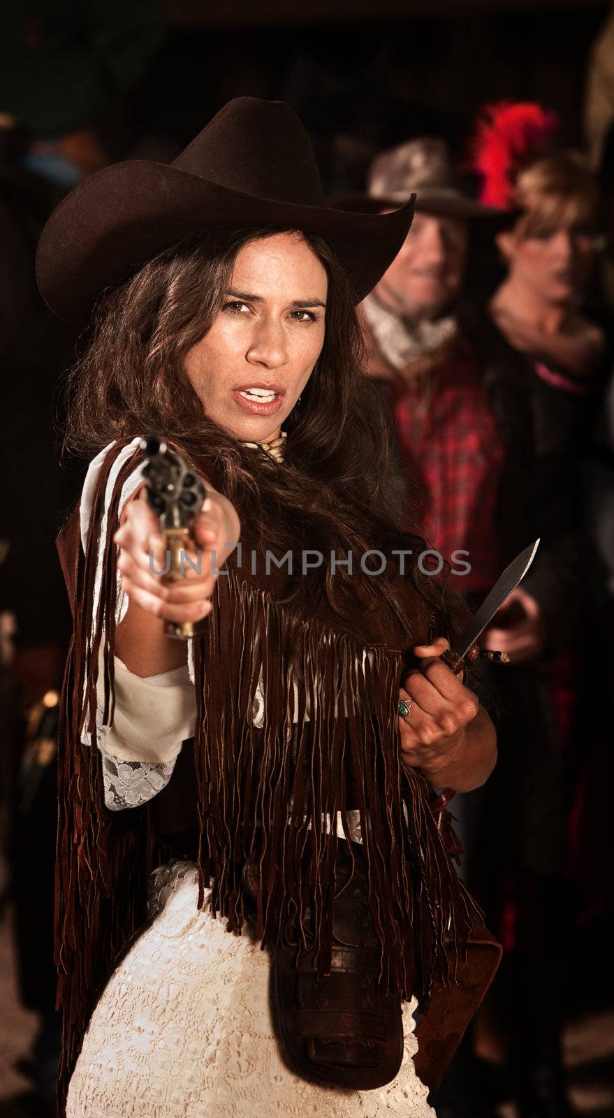 Female Native American gun fighter with revolver and dagger