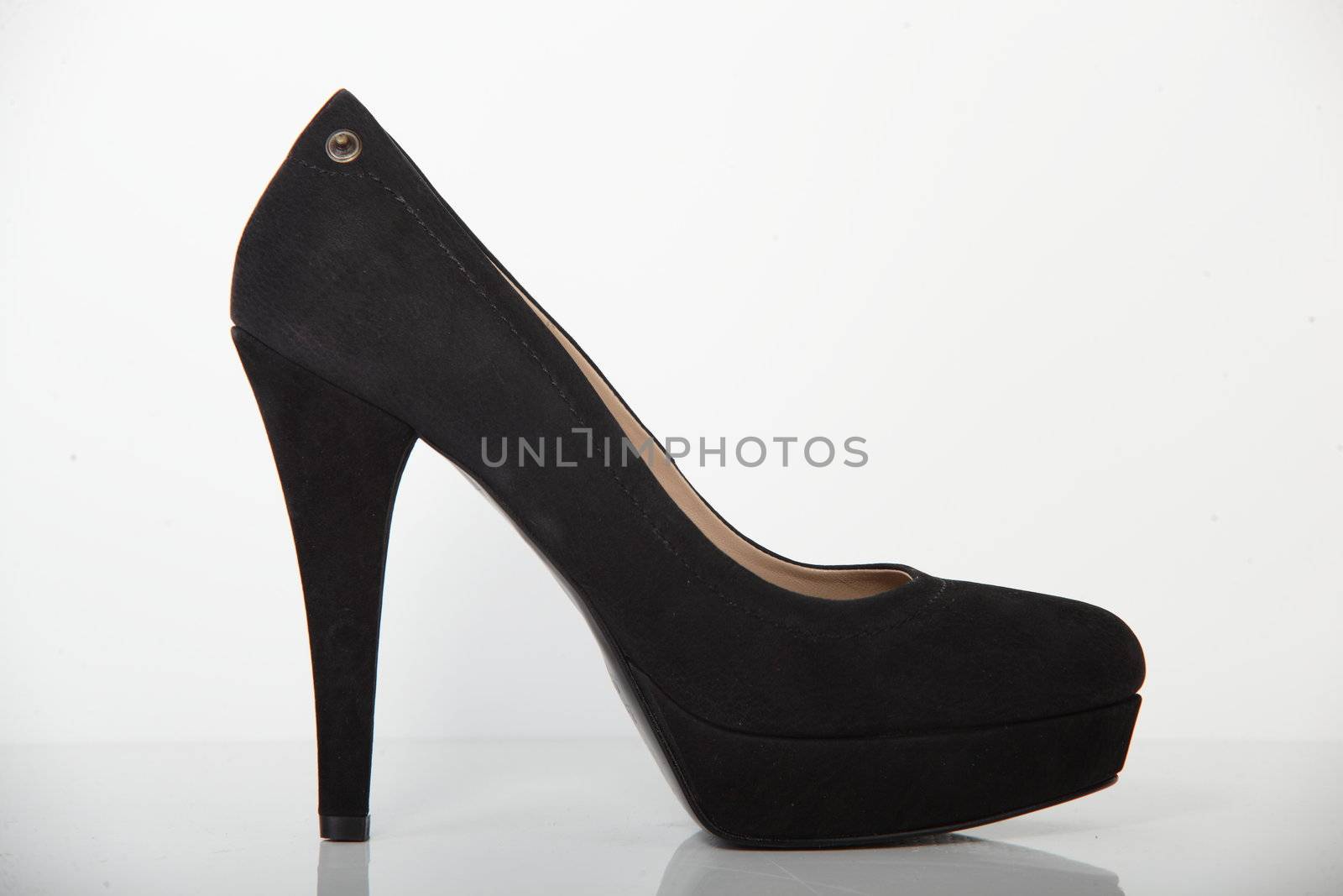 woman brand new shoe on white background