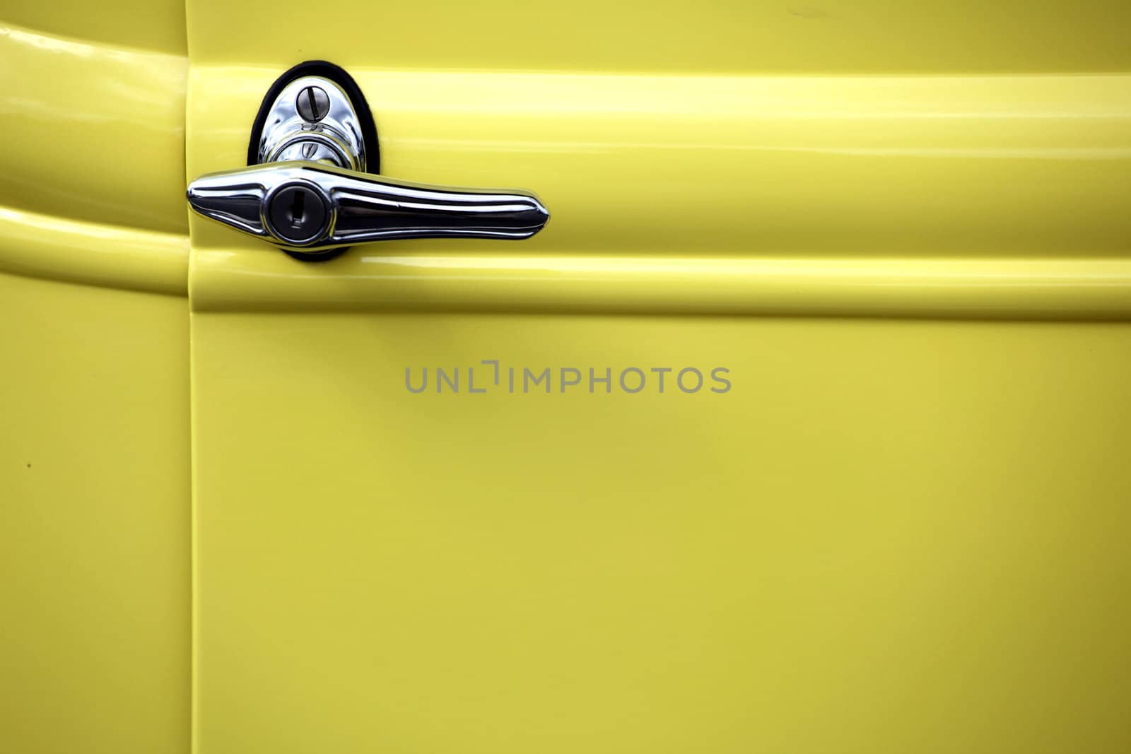 Classic yellow car door.