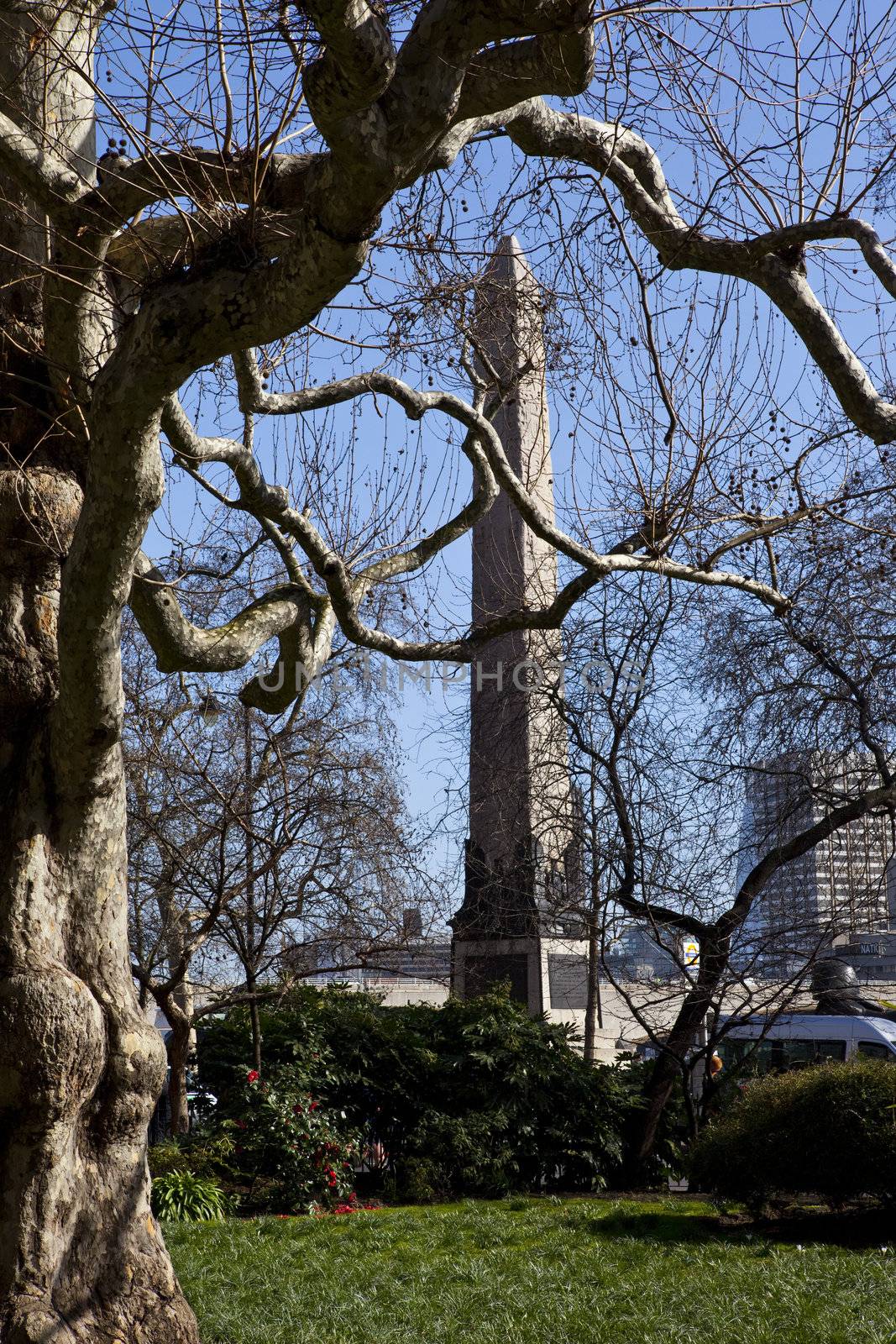 View of Cleopatra's Needle from Embankment Gardens in London by chrisdorney