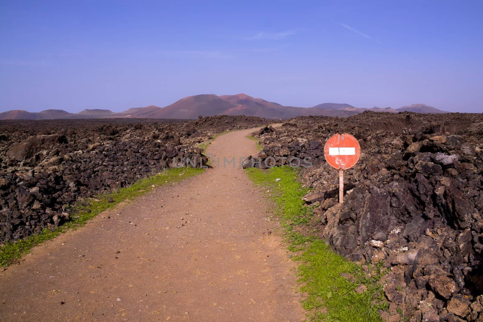 Road to volcanic park Timanfaya on island of Lanzarote, Canary Islands
