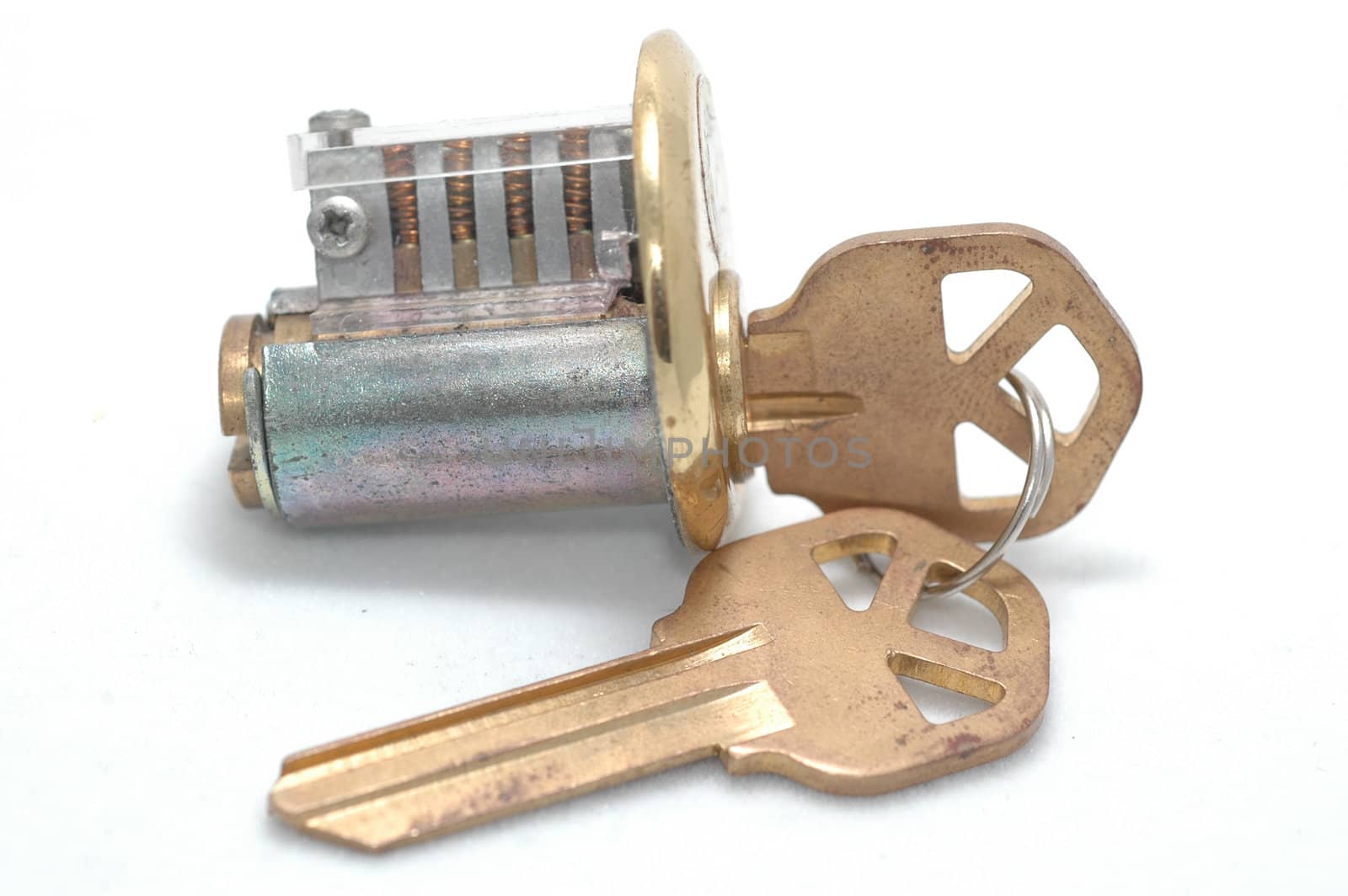 Cutaway pin-tumbler lock with the correct key inserted