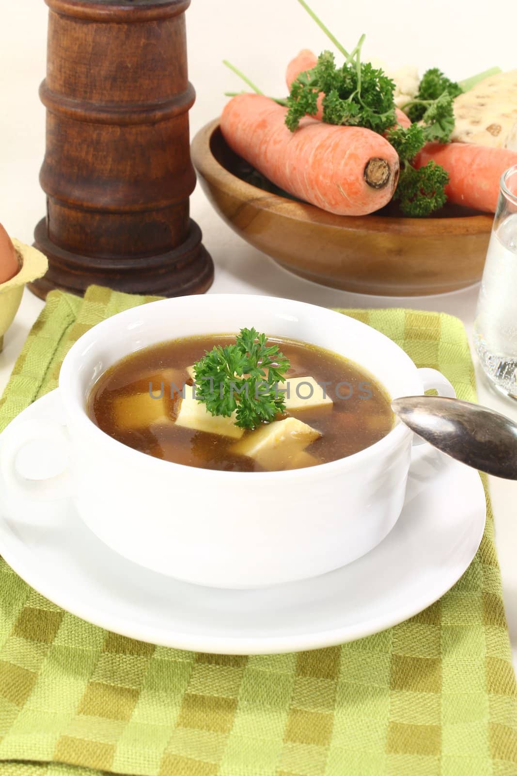 Beef consomme with parsley by discovery