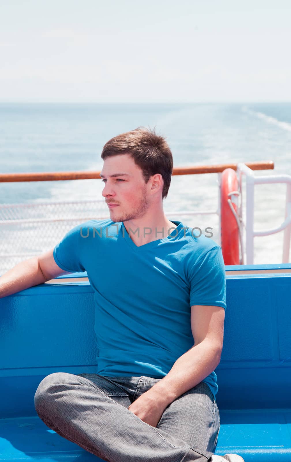 Young man in vacation on a yacht