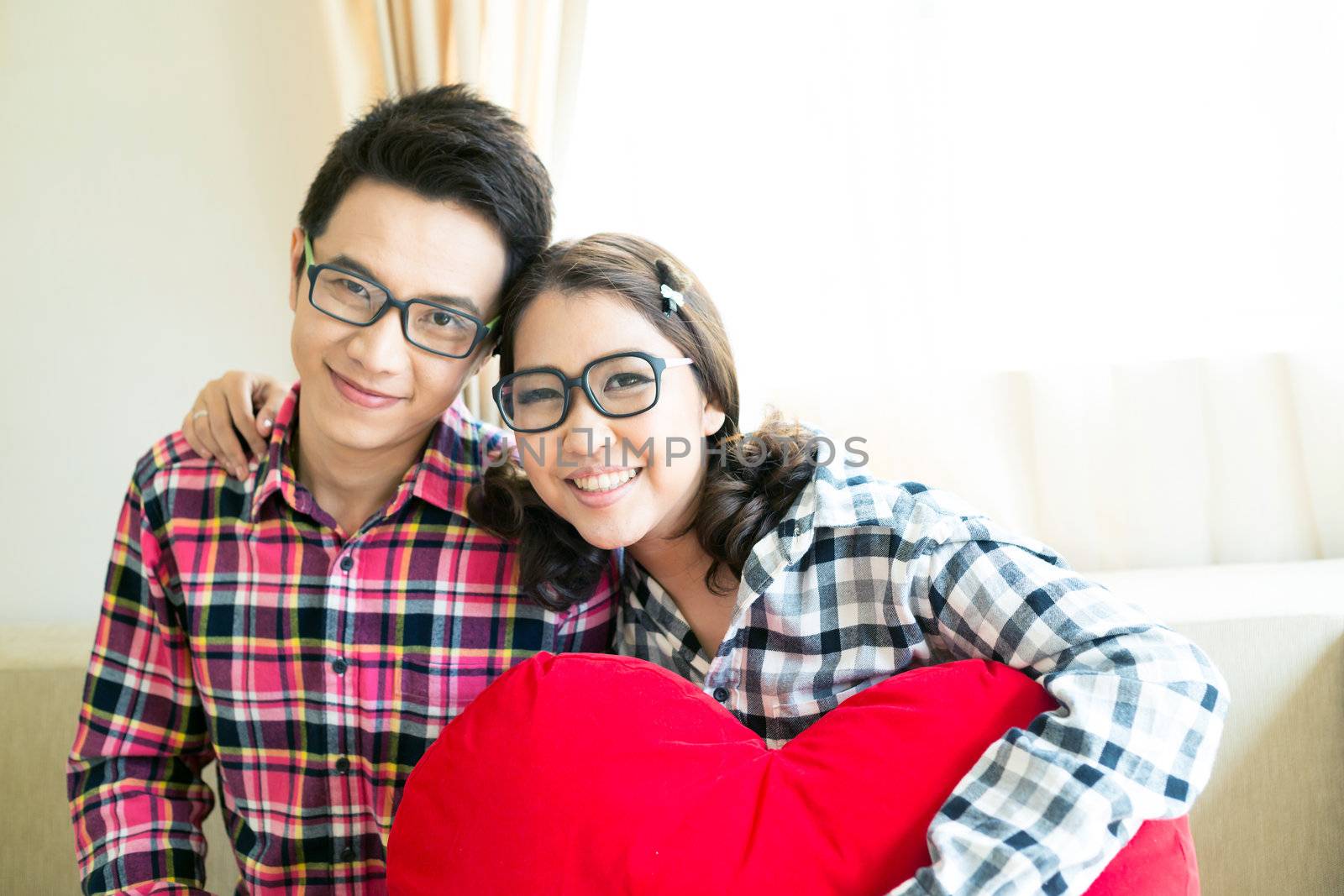 Happy Young adult Couples in living room