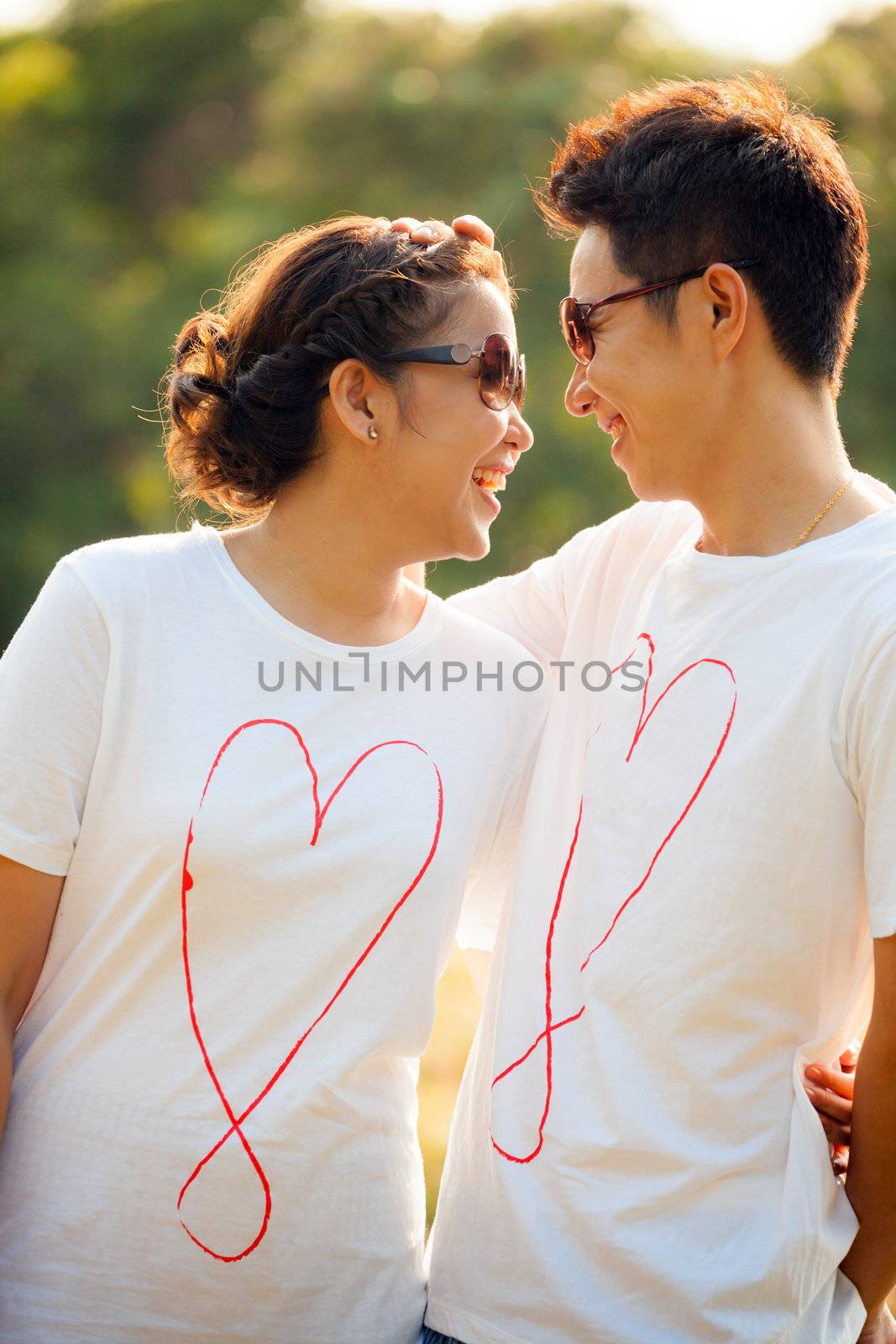 Happy Young Adult Couples in love outdoor