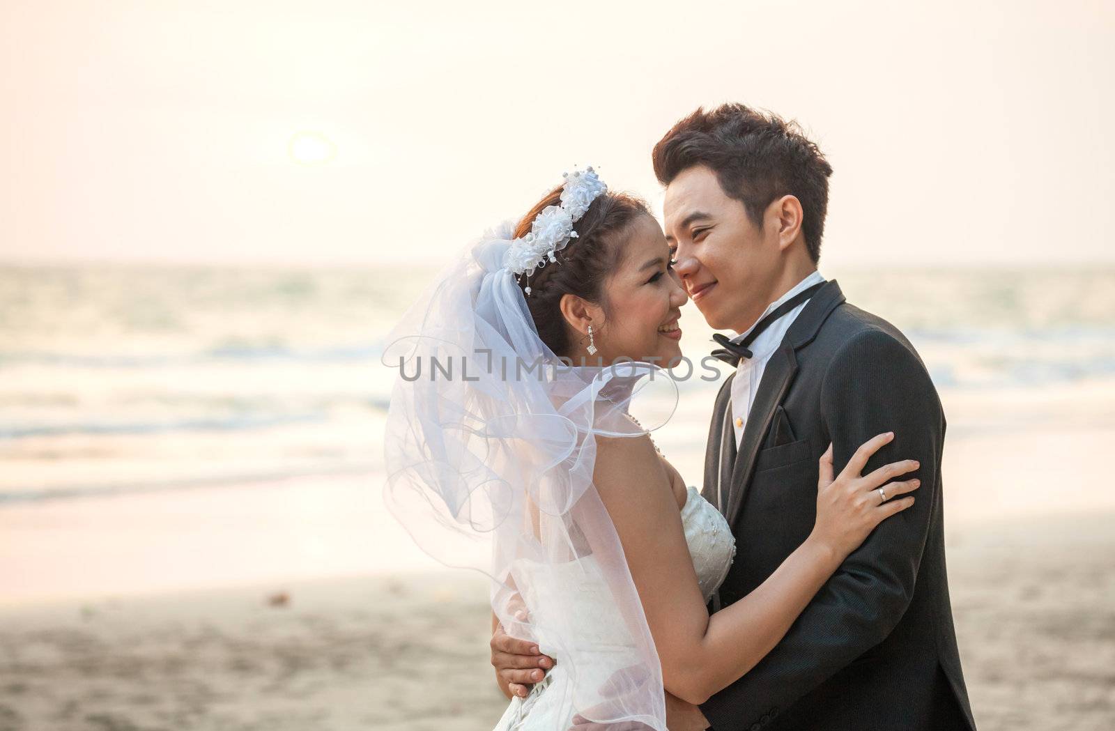 happiness and romantic Scene of love couples partners wedding on the Beach