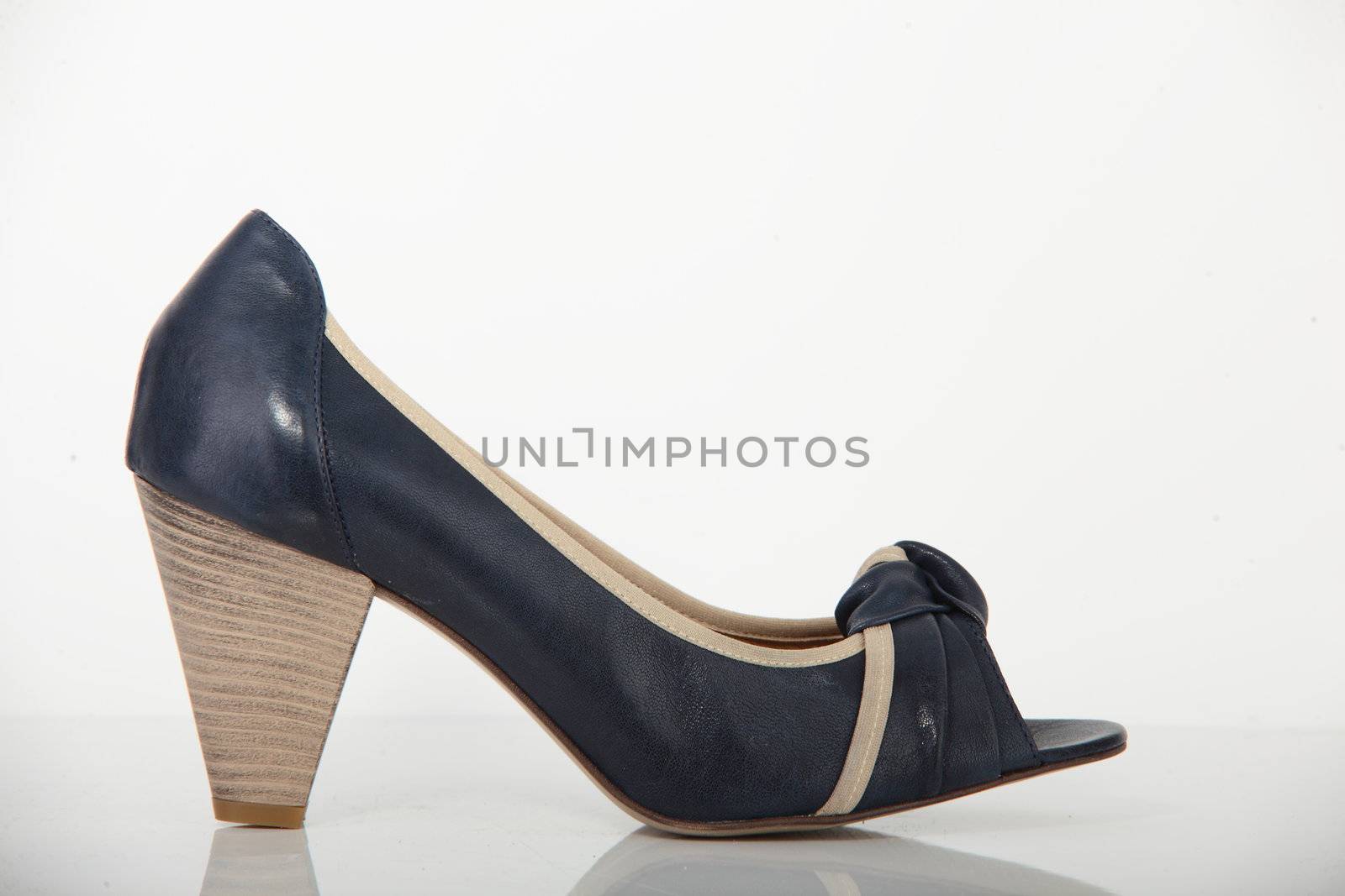 woman brand new shoe on white background