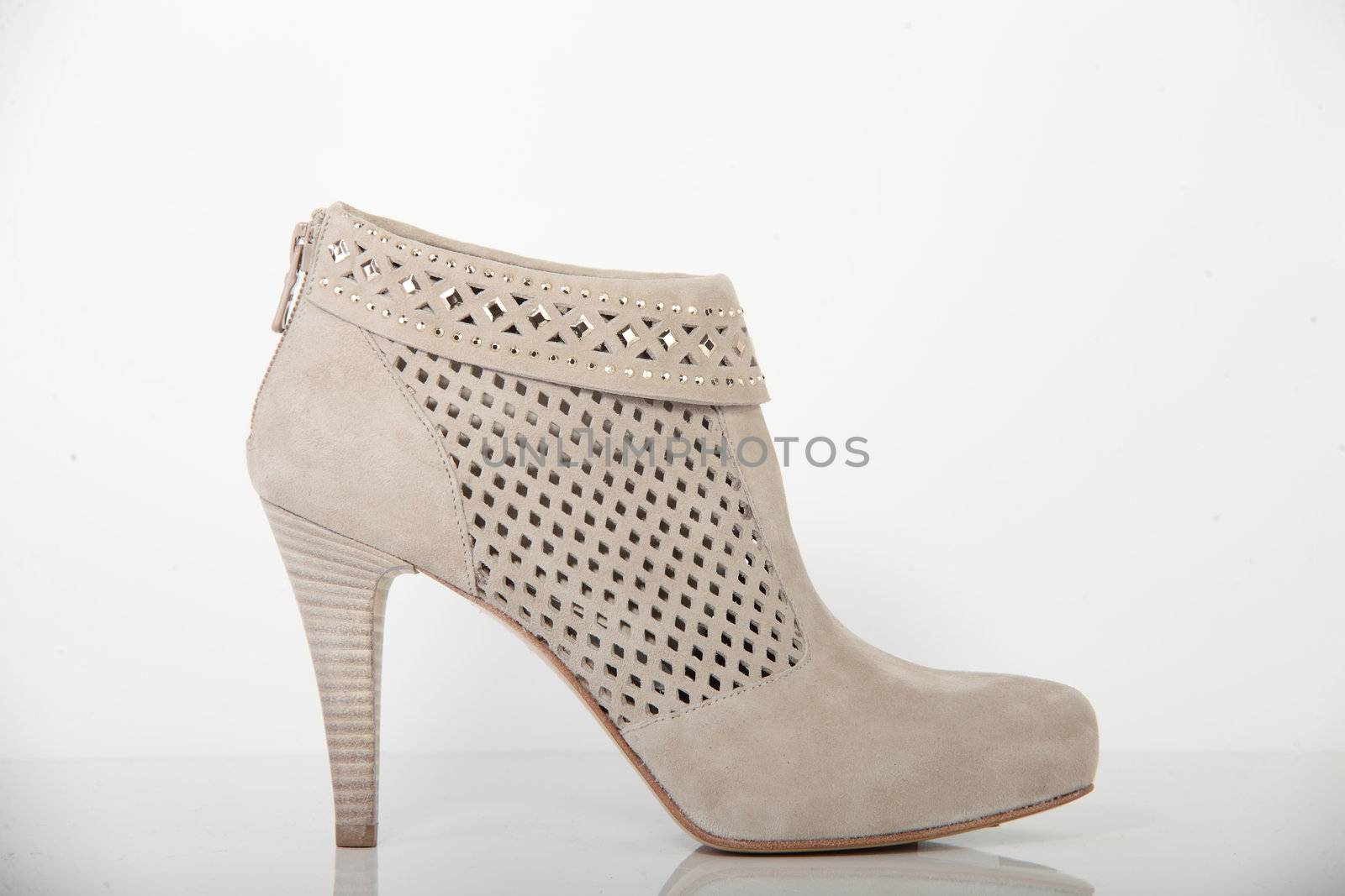 woman brand new shoe on white background