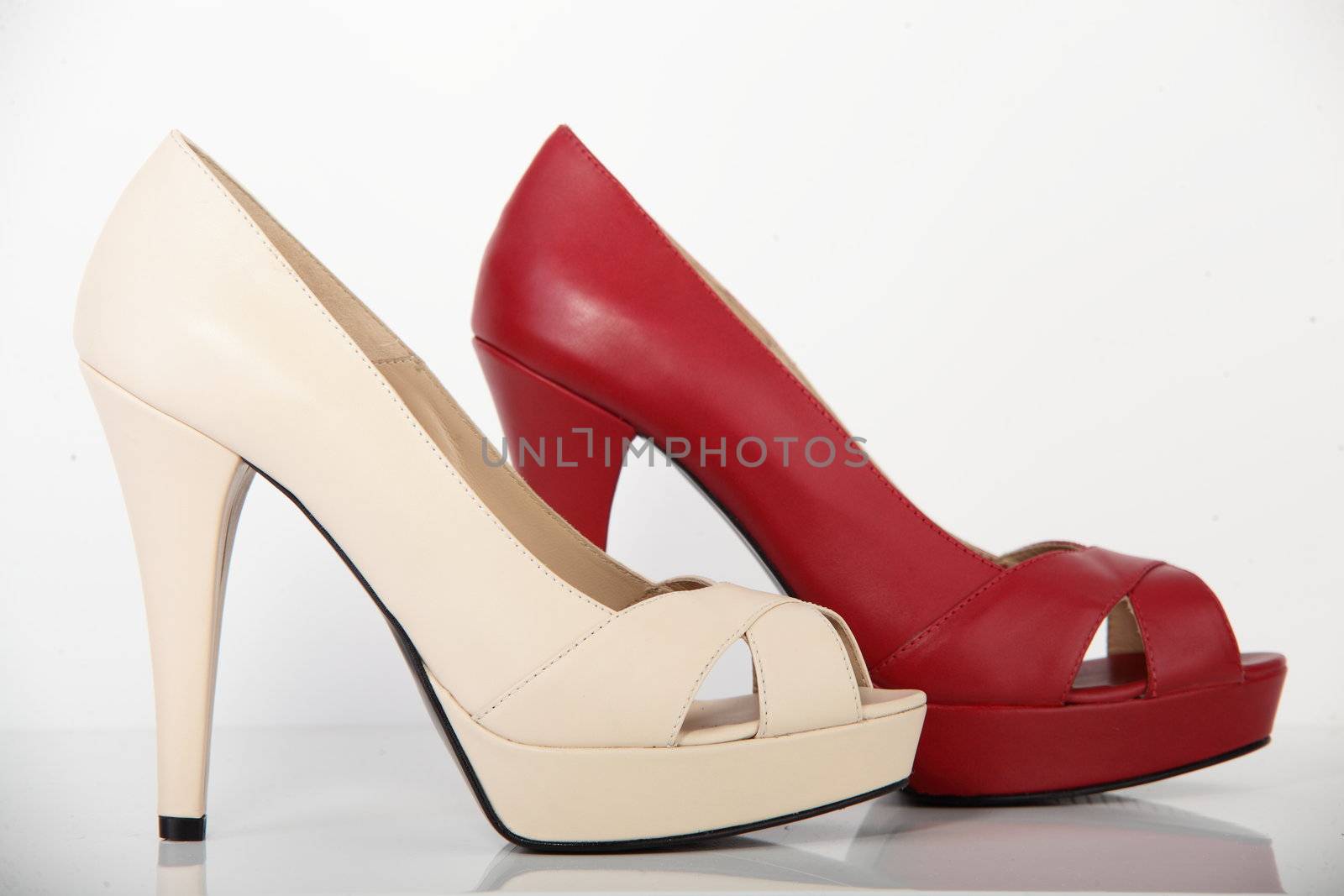 woman brand new shoe on white background