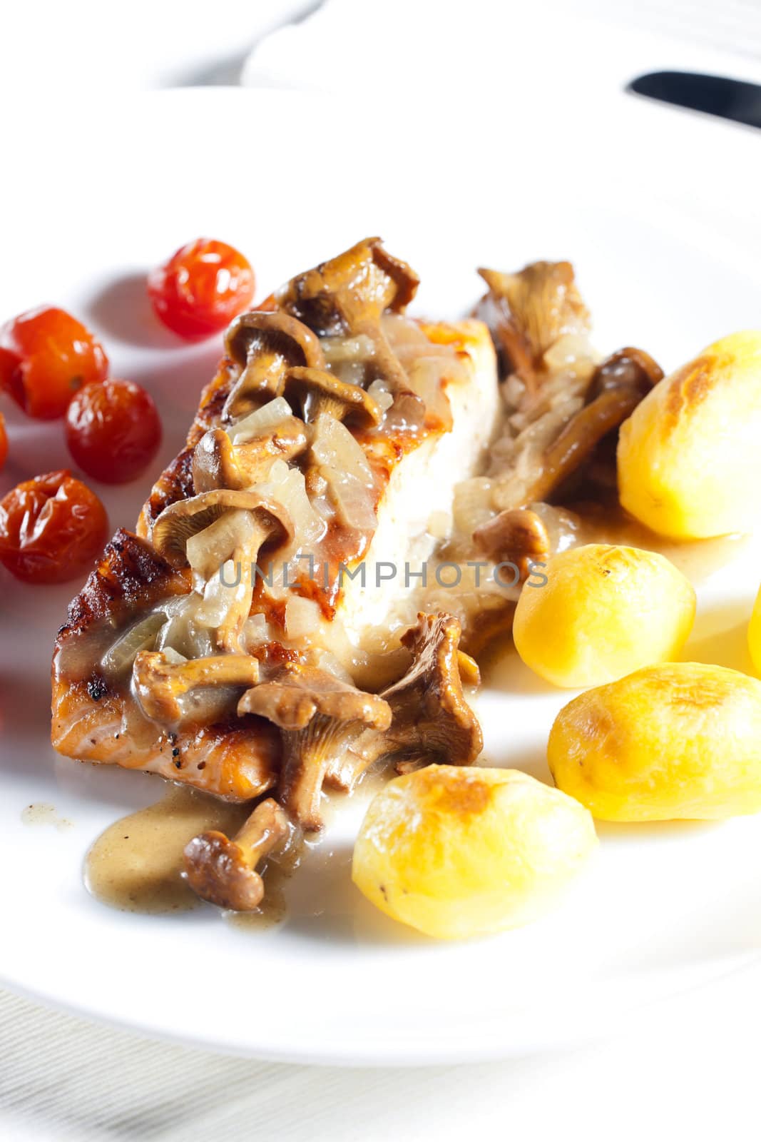 grilled salmon with mushrooms and cherry tomatoes