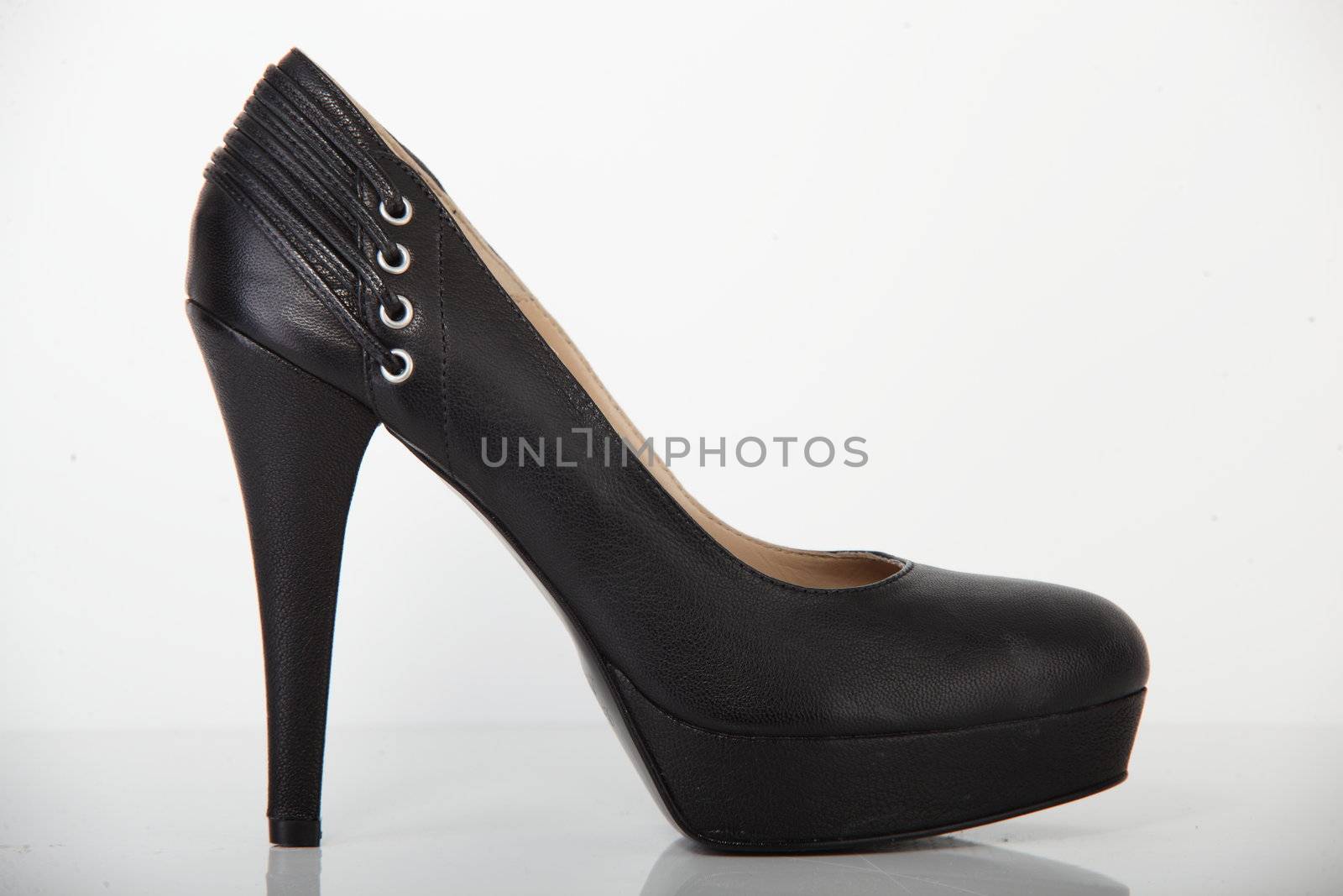 woman brand new shoe on white background