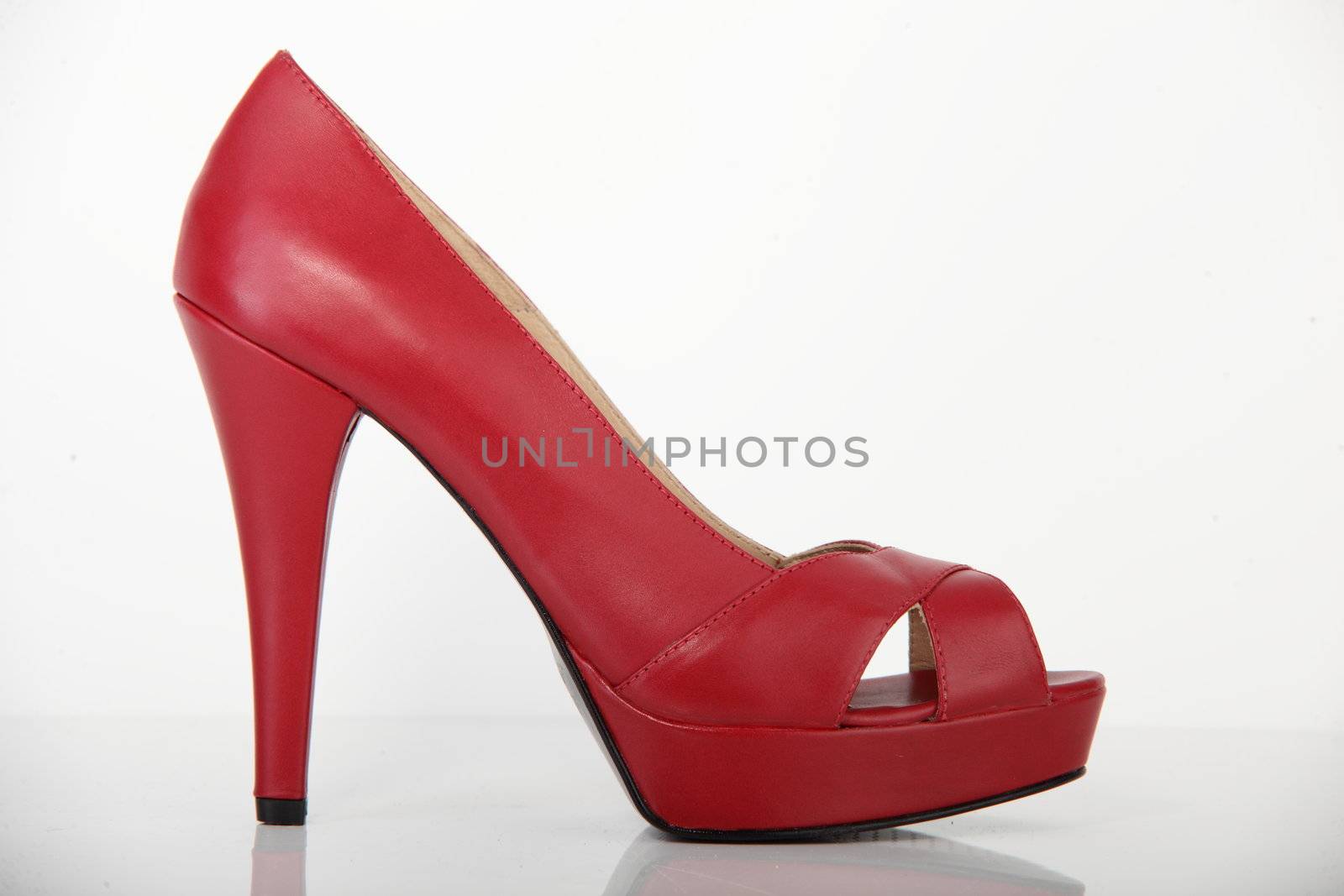 woman brand new shoe on white background