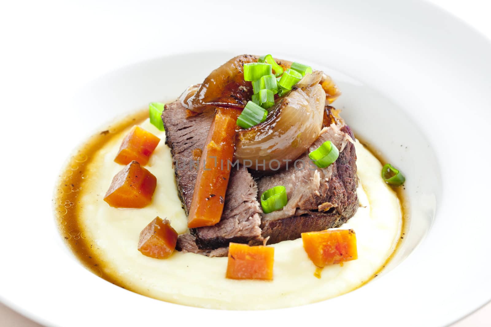 beef stew with carrot and mashed potatoes