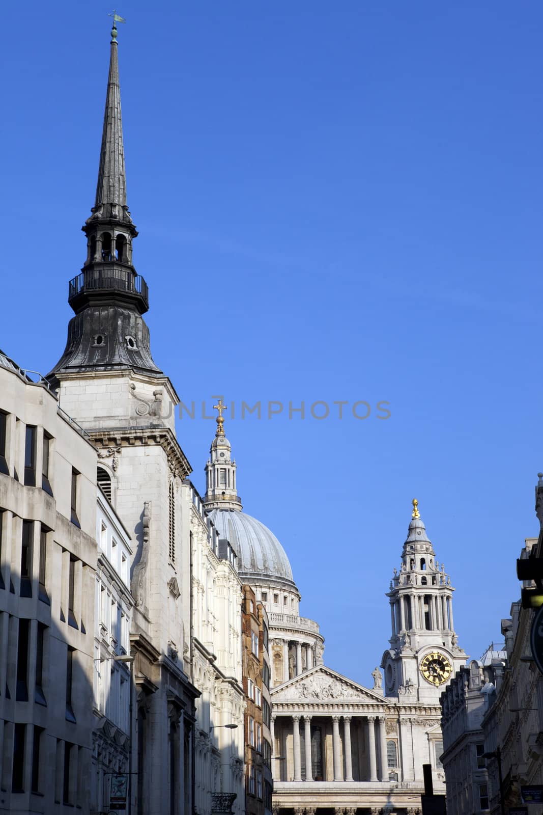 View of St Martin within Ludgate and St. Paul's Cathedral from Ludgate Hill in London.