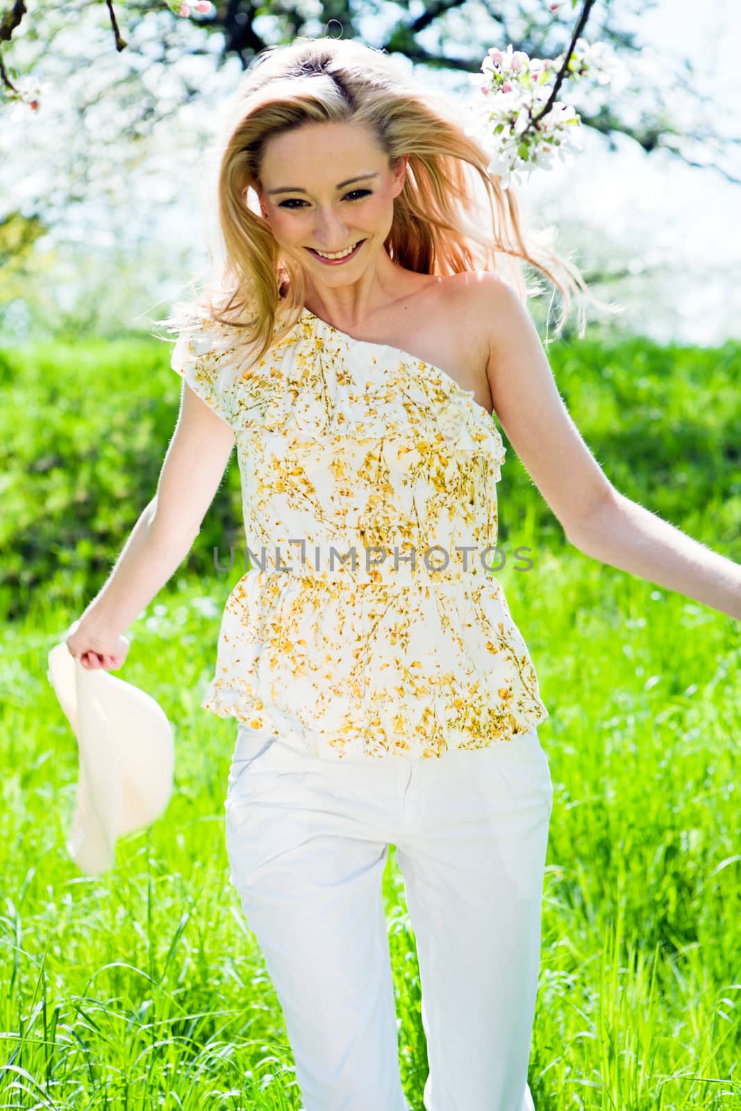 beautiful young girl happy in summer outdoor