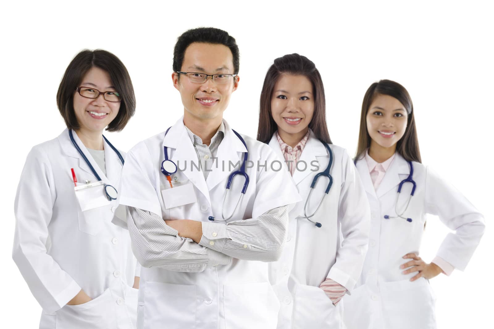 Asian medical team standing on white background