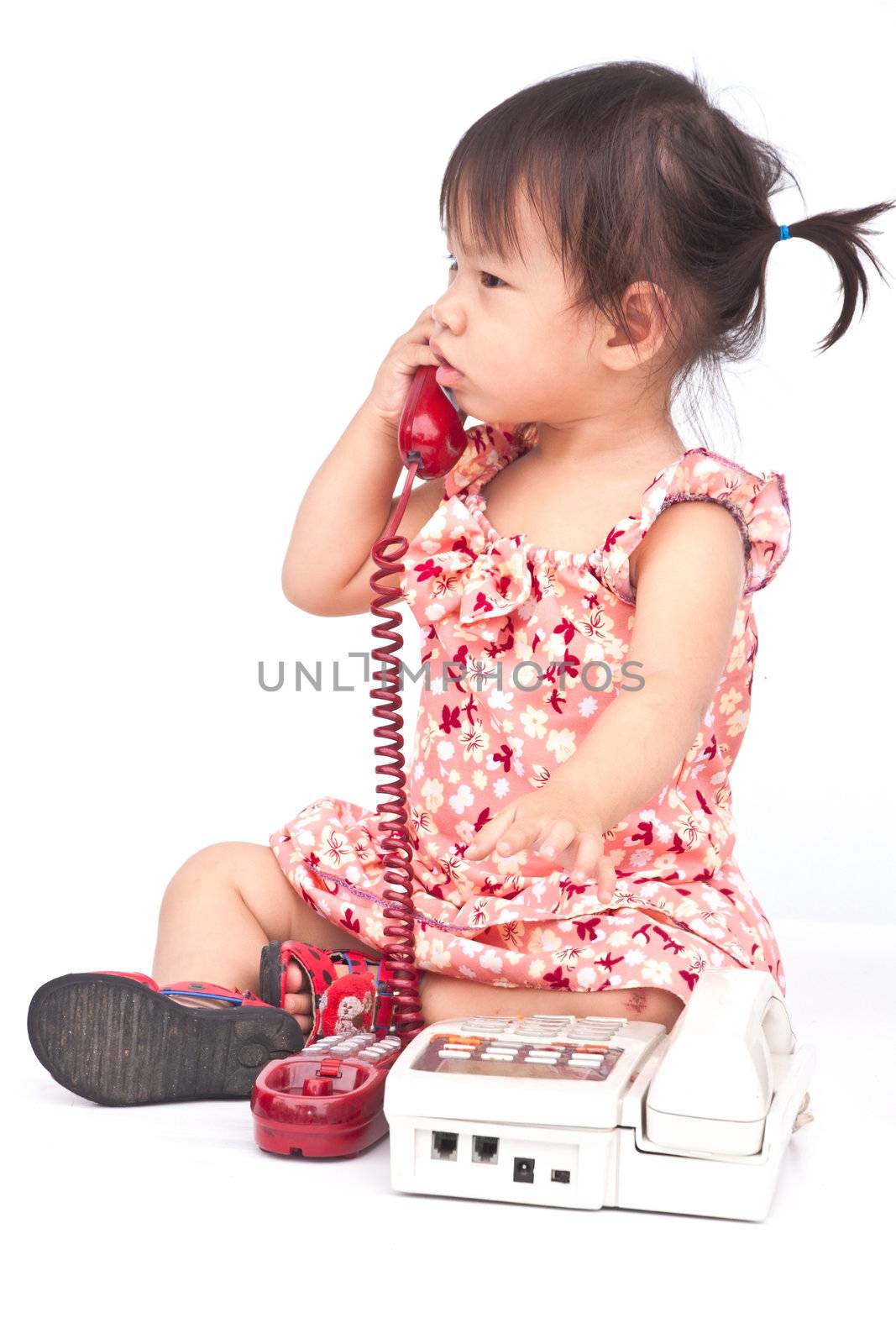 Baby dialing old beige phone calling mom  by Yuri2012