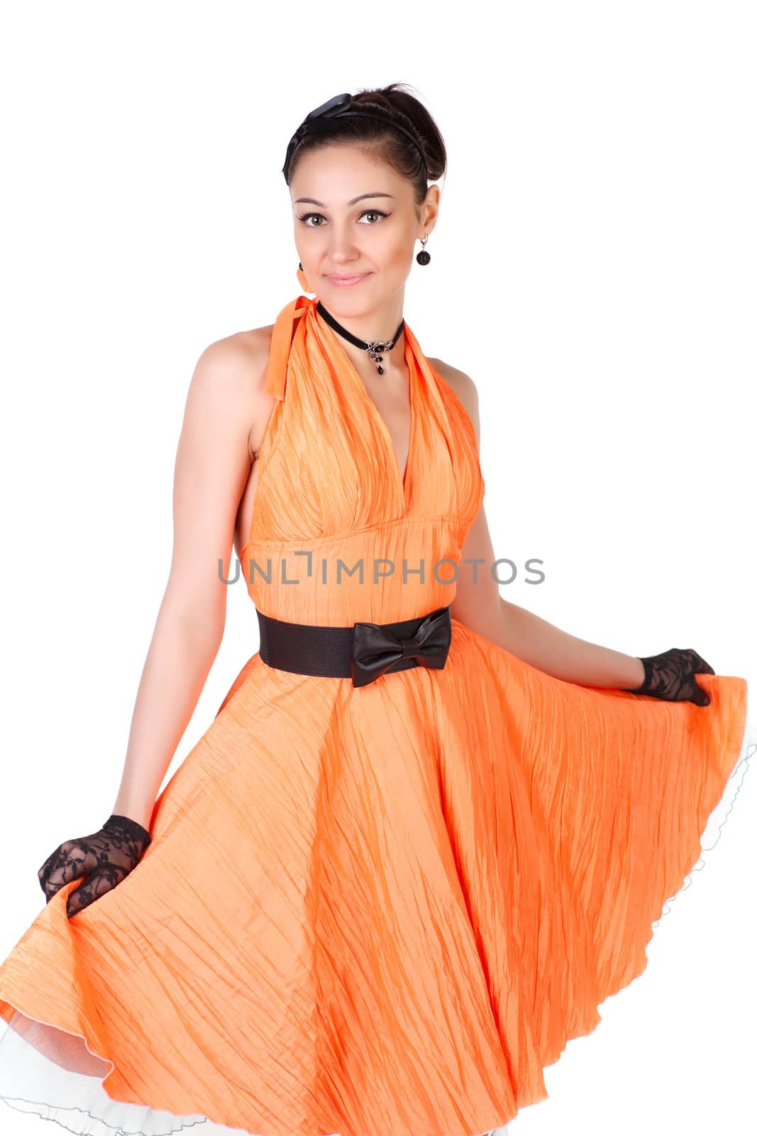 Young dancer woman in orange retro dress.