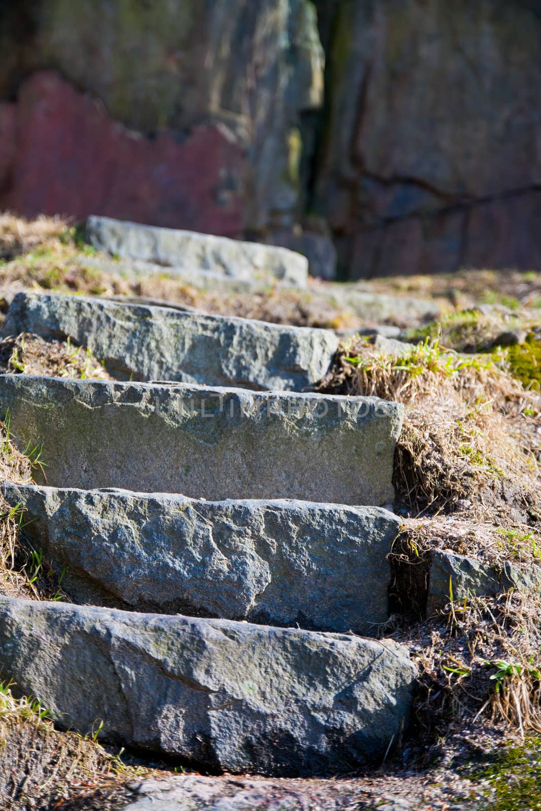 Rock stairs leading to a cliff