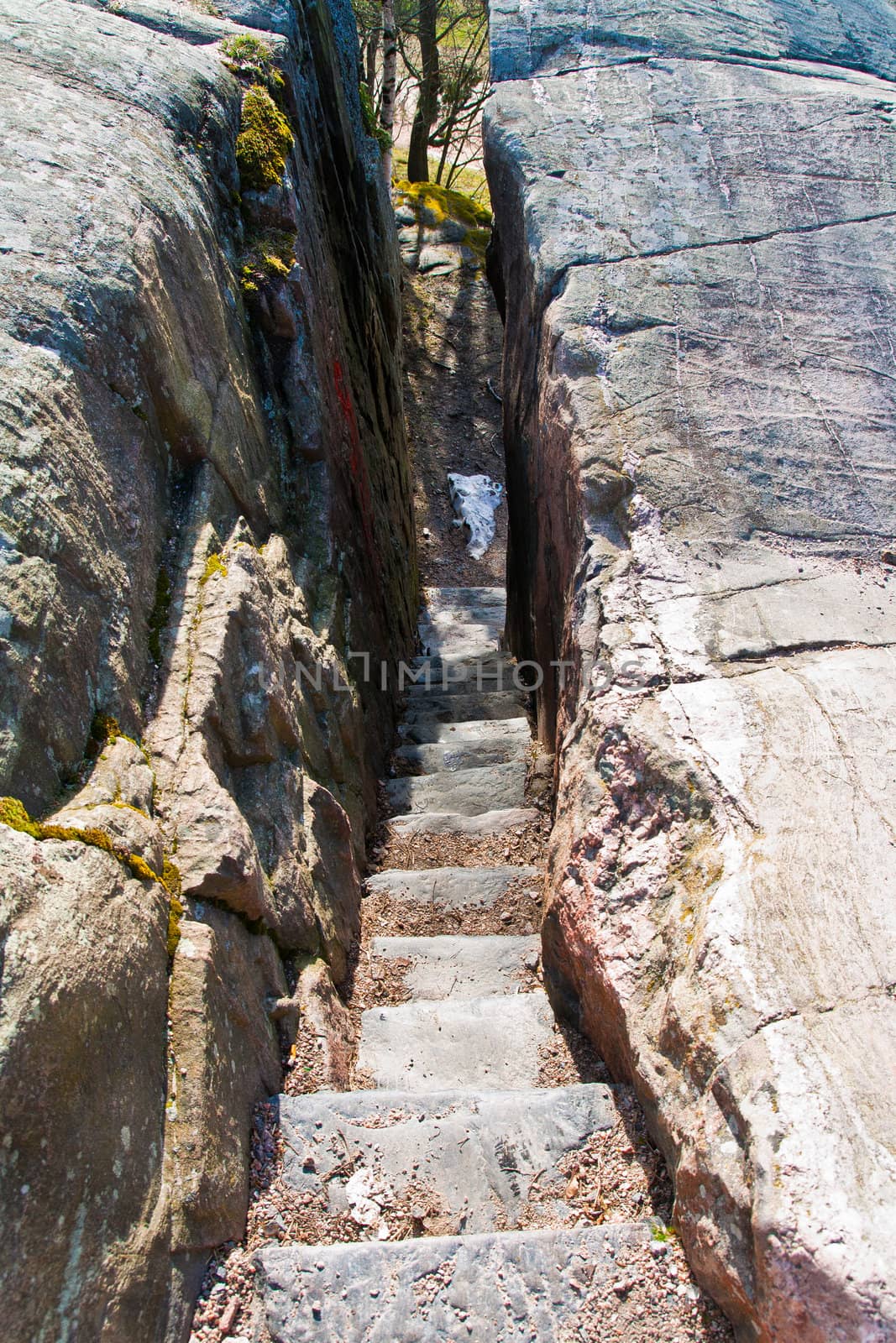 Rock stairs leading down from a cliff