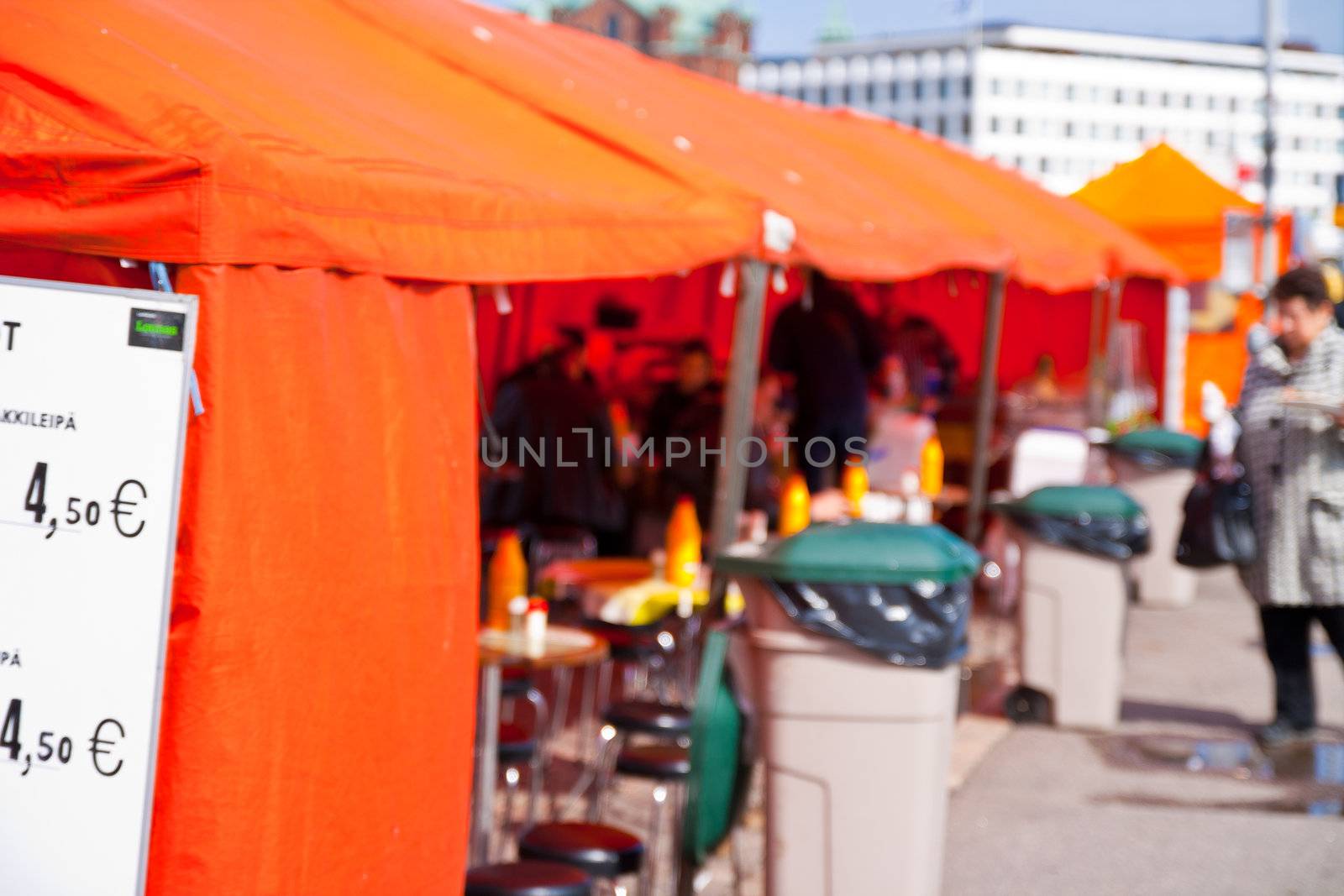 Market fair with tents and unregonisable people