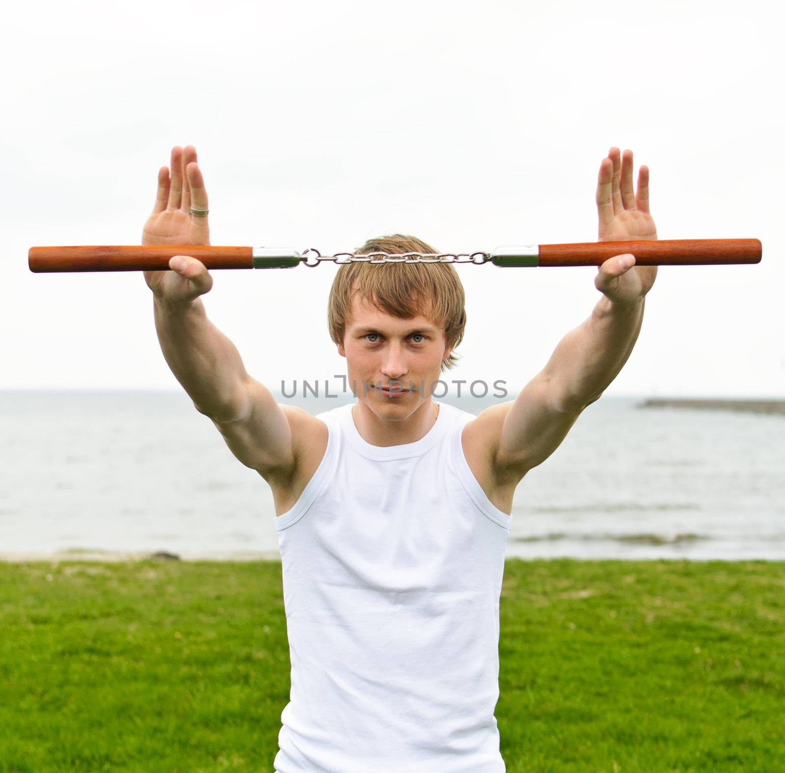 Martial arts: Man with nunchaku 