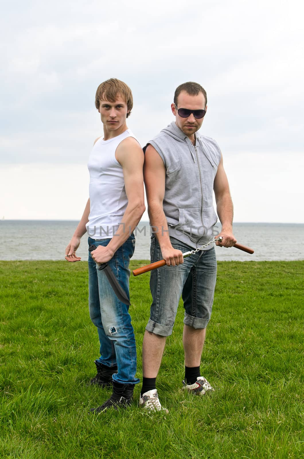 Fight club: Two fighters standing back to back