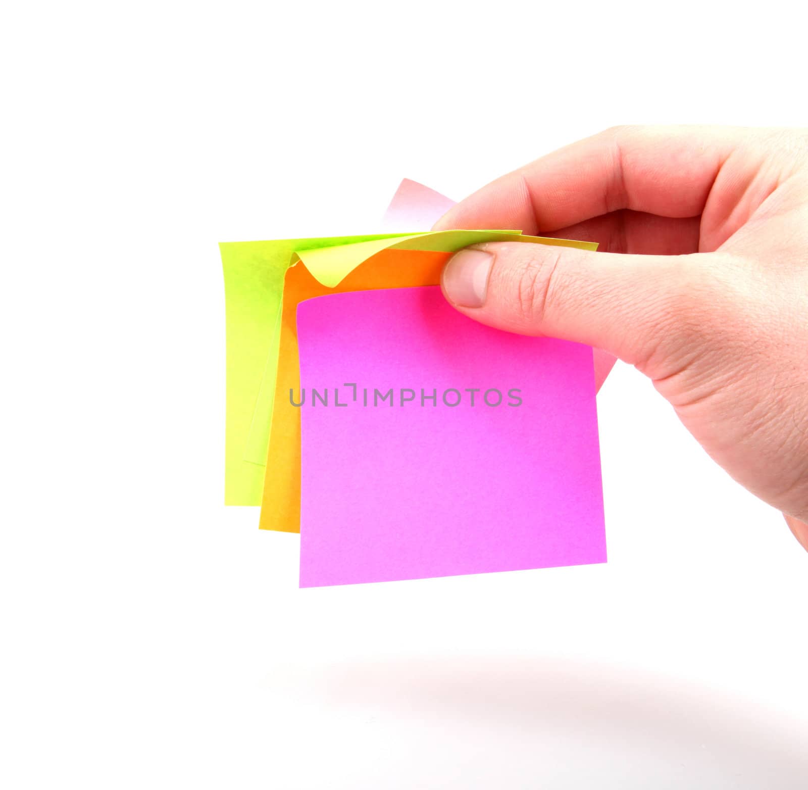 Hand and note paper isolated on white background.