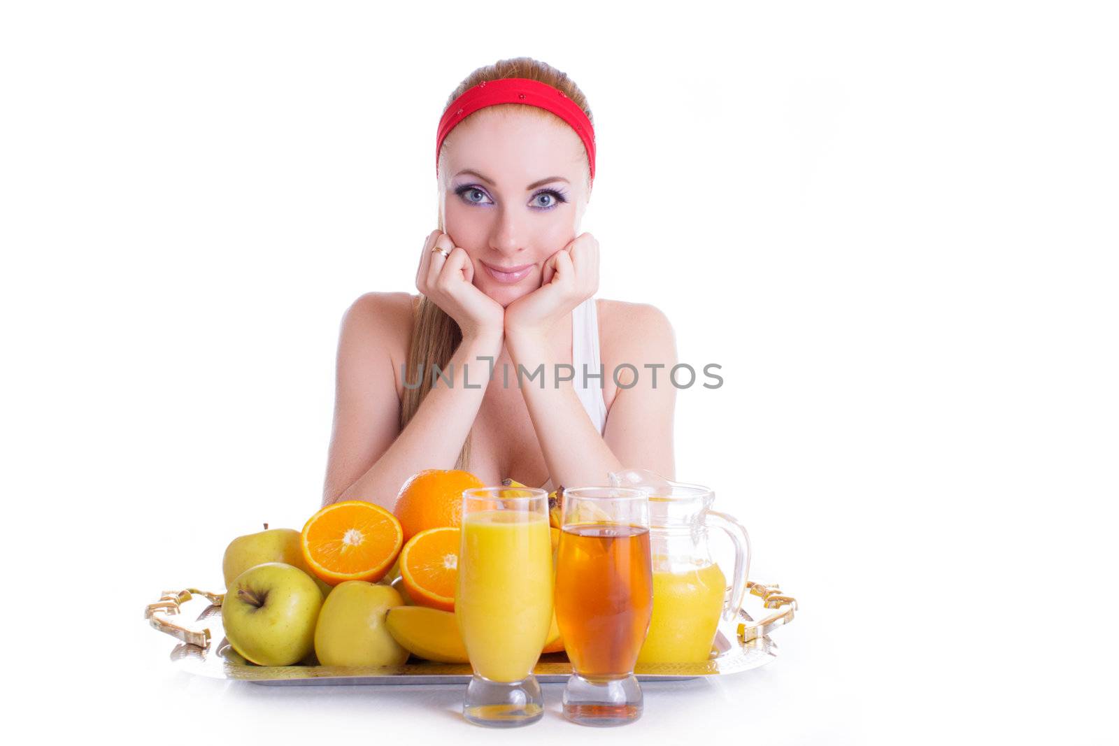 Sporty woman with fruits and juice over white