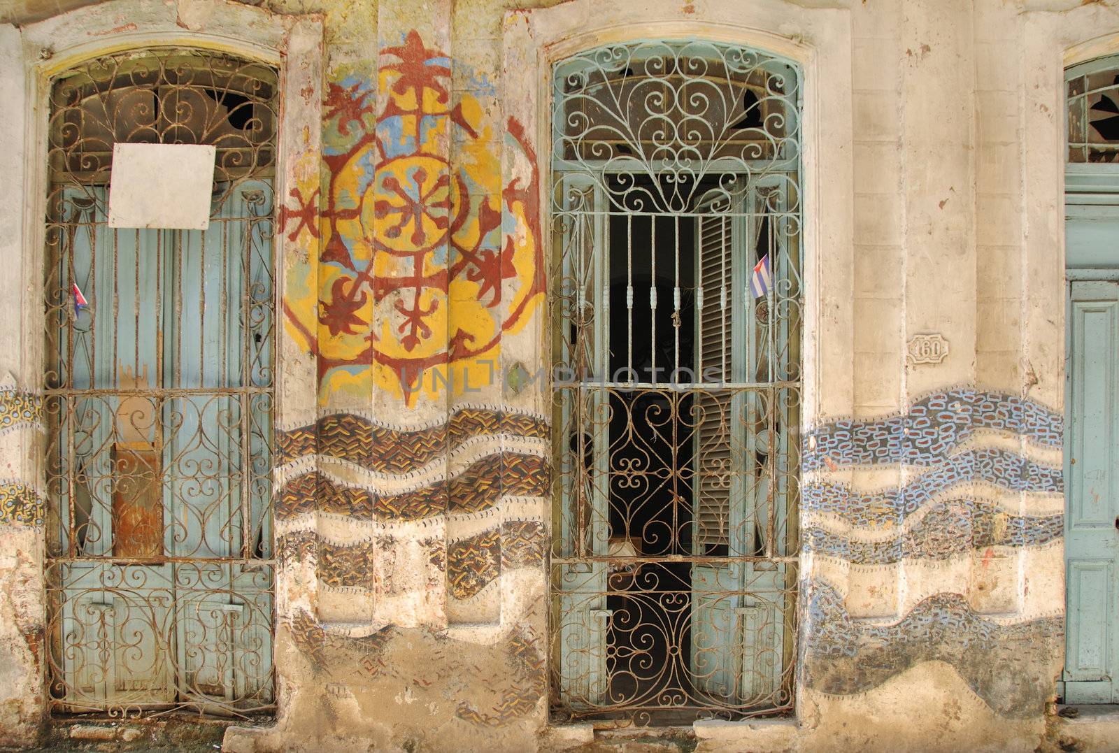 Abstract facade with windows in old Havana street, cuba