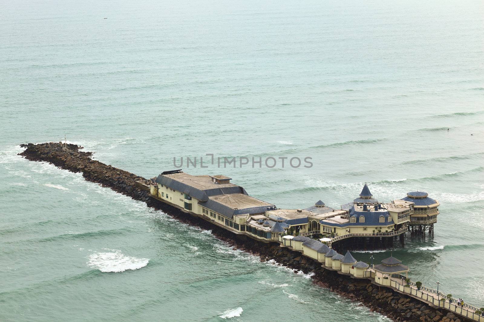 Lima, Peru - September 20, 2011: La Rosa Nautica Restaurant built on a pier stretching into the Pacific Ocean in the district of Miraflores, Lima, Peru.