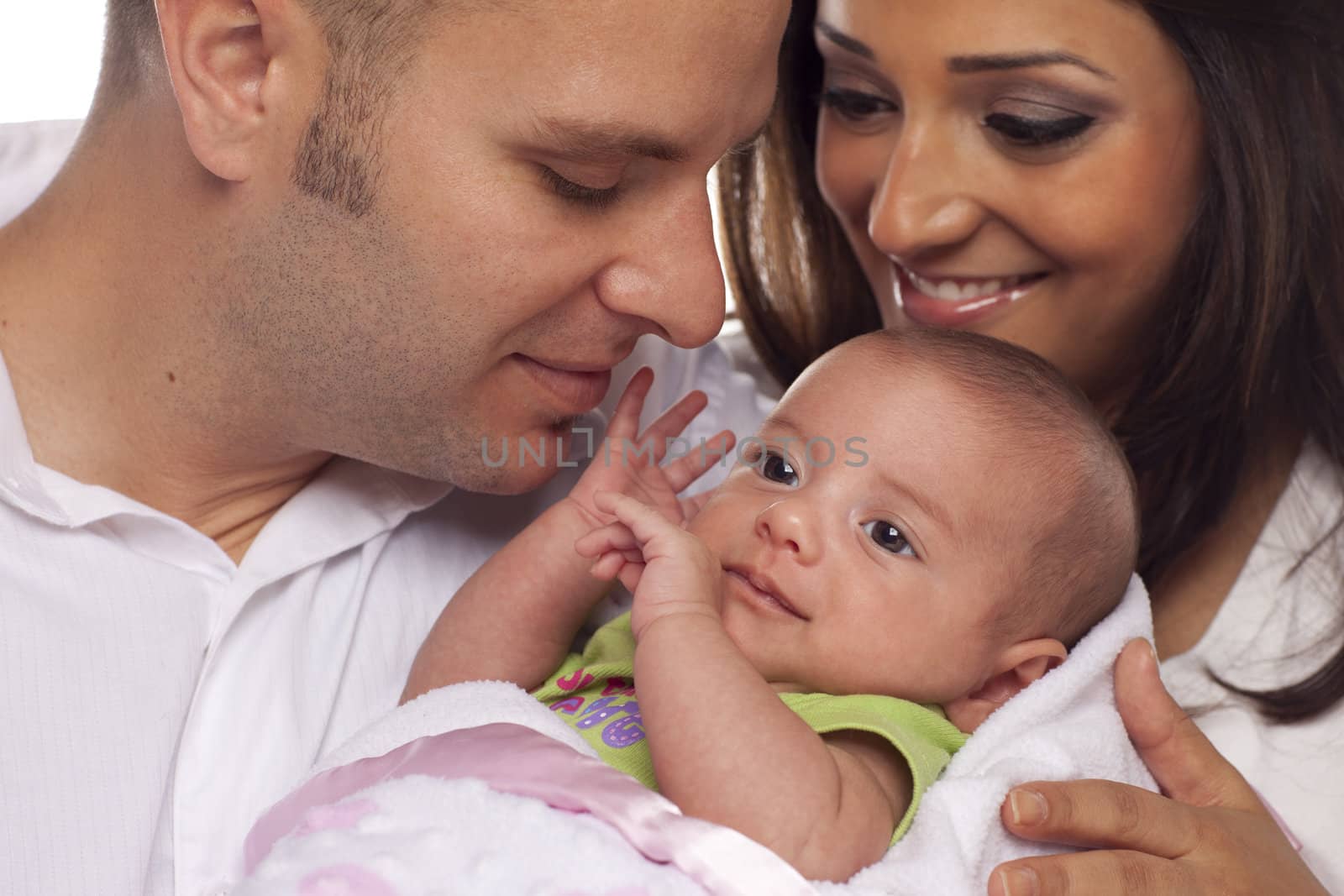 Happy Young Attractive Mixed Race Couple with Newborn Baby.