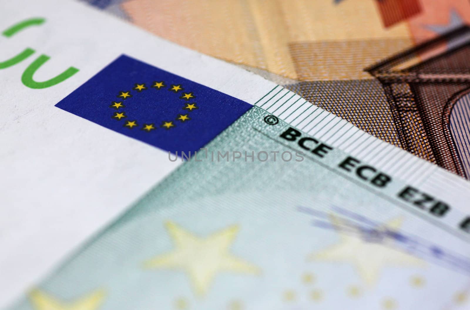 close up of European Union flag on 100 euro banknote