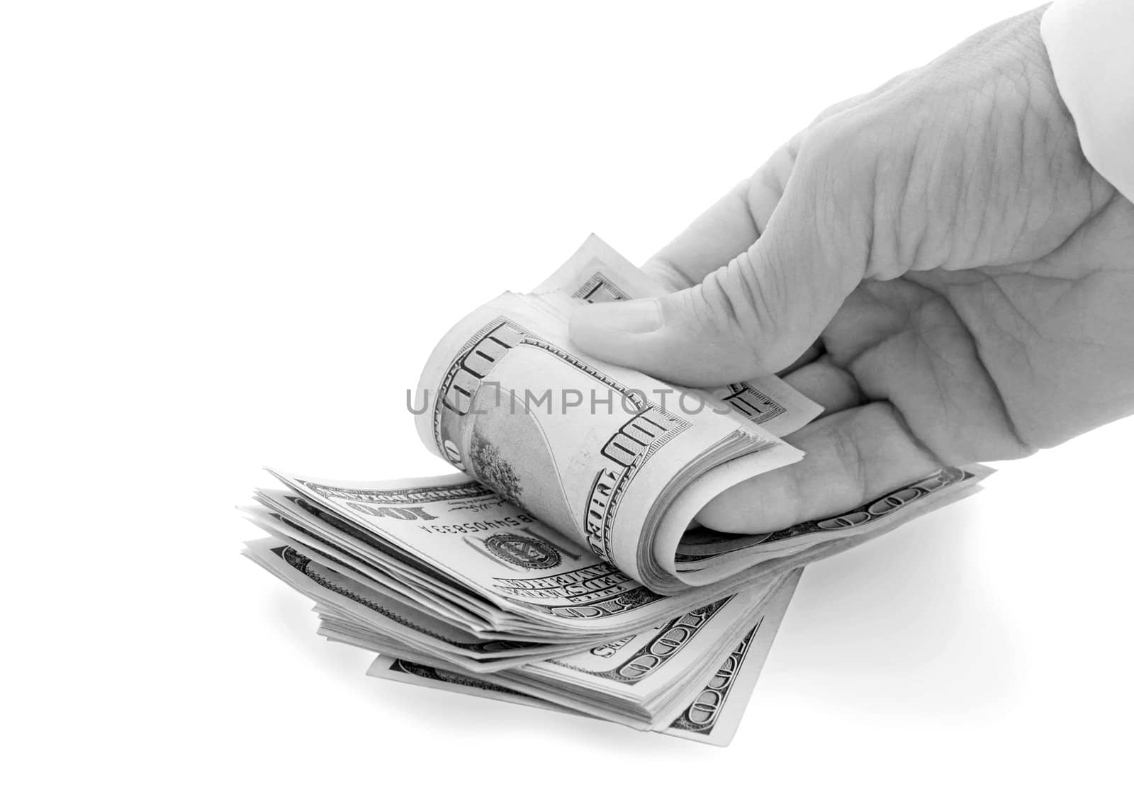 hand fingers pile of dollars