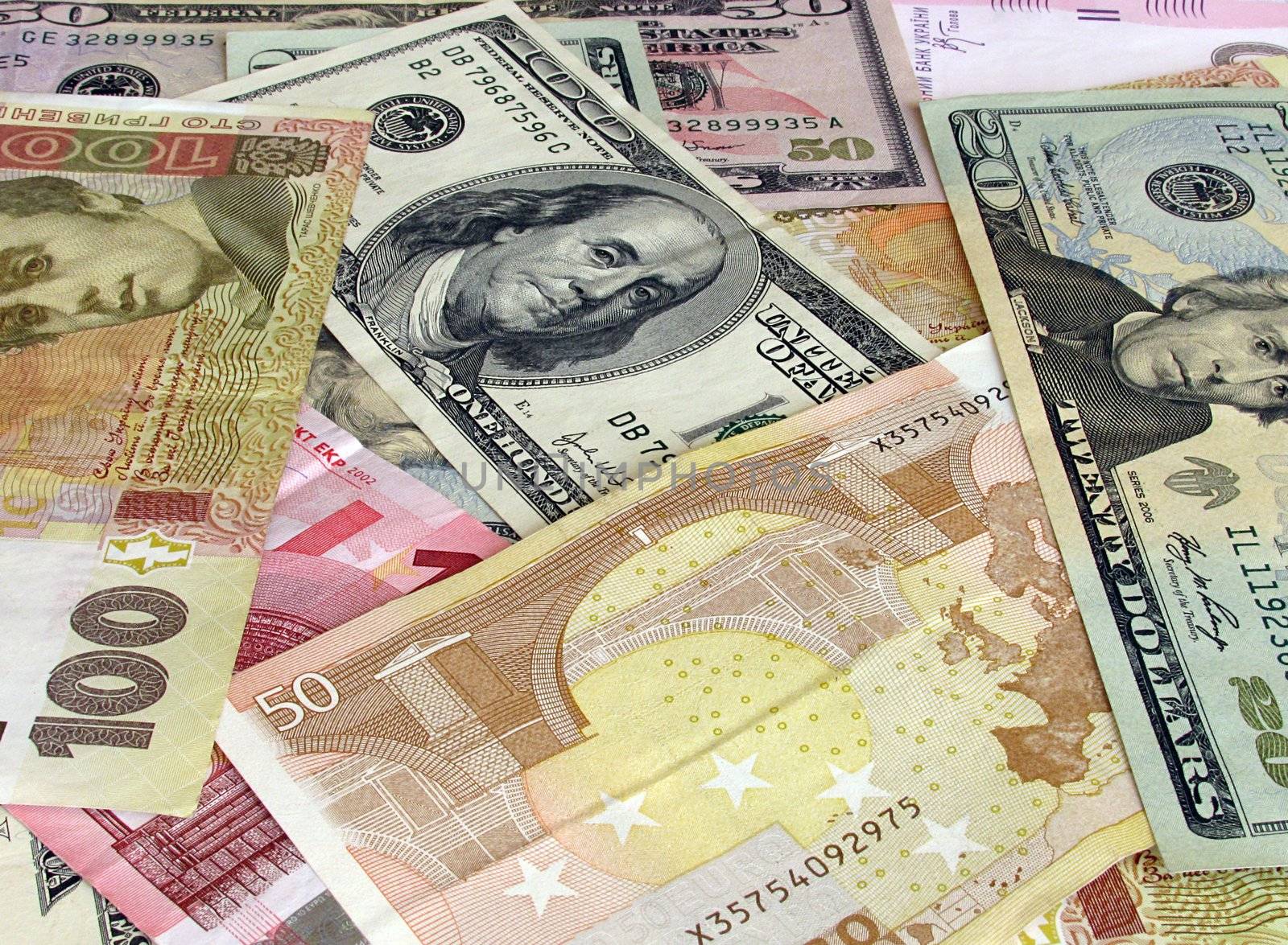 cash background : dollars , euros and hrivna