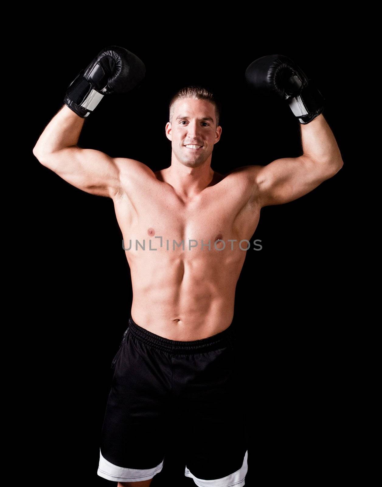 Muscular man isolated on black background