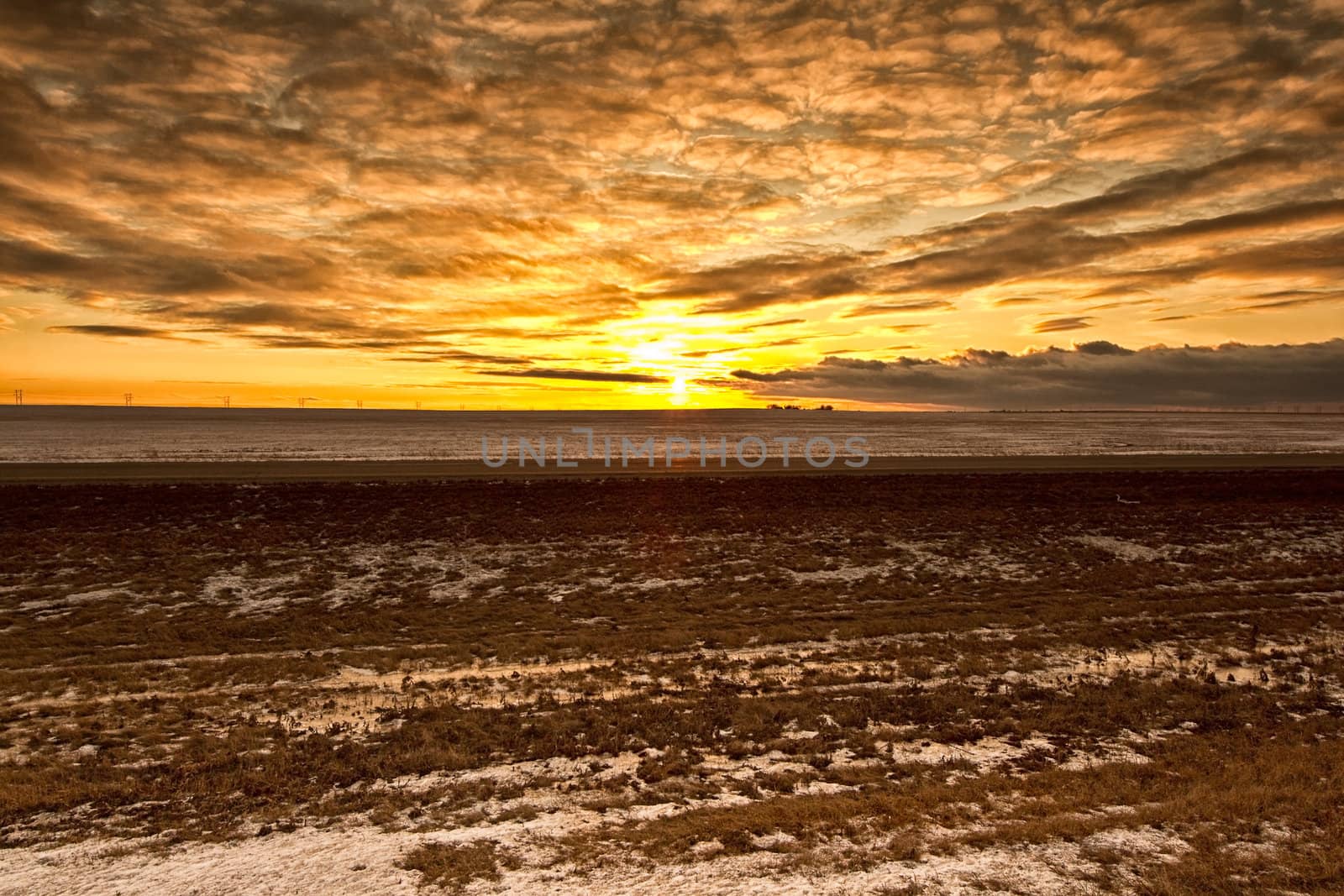 Stormy clouds over the sky during a sunset on a cold winter day in Regina