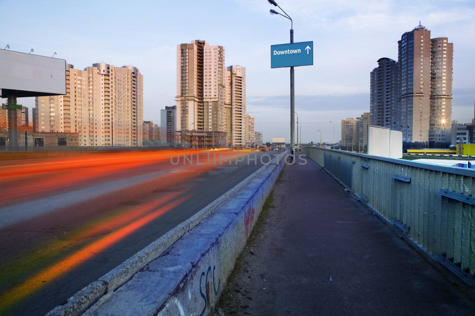 deserted bridge in microdistrict of Kyiv at evening time