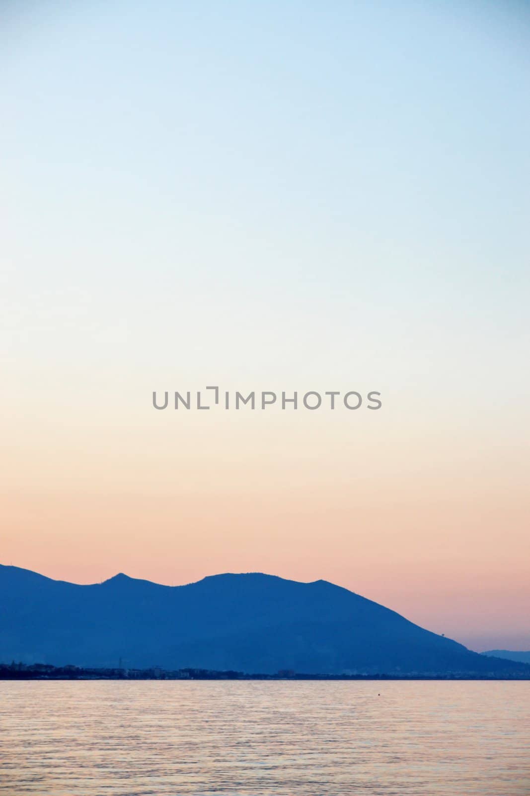 sea view at the evening with mountains