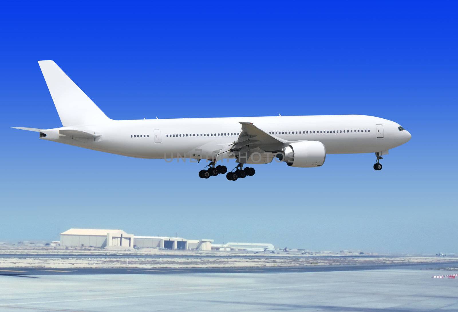 big passenger airplane is landing to runway of airport