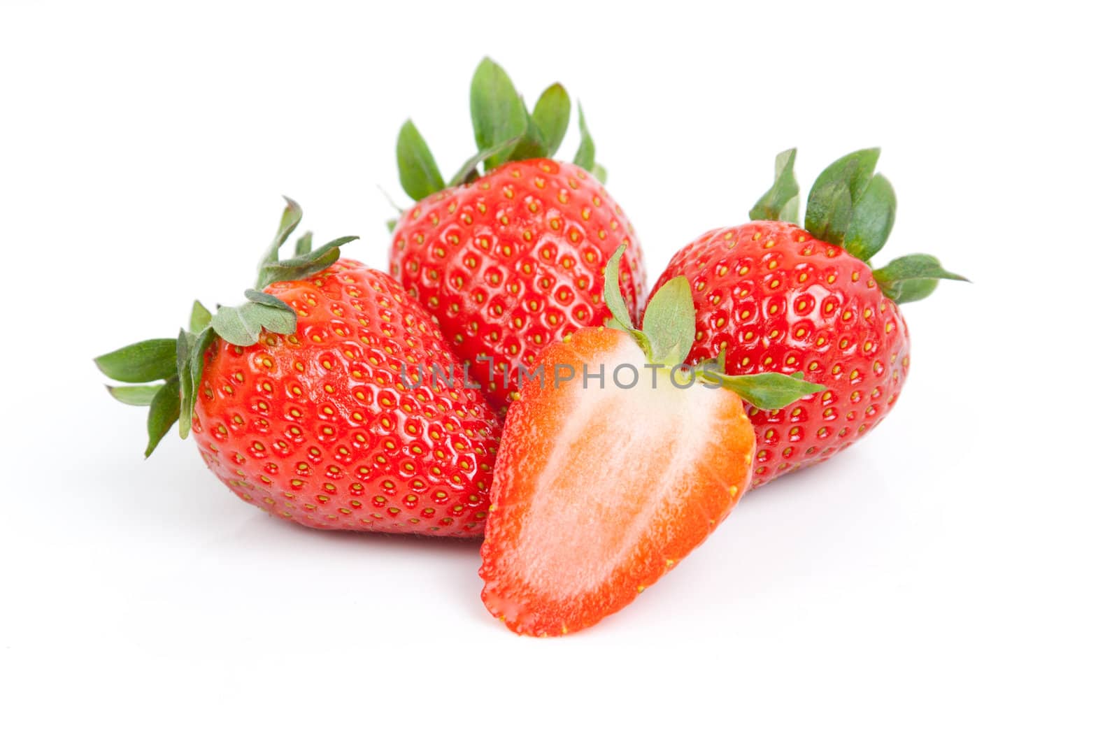 three and a half strawberry isolated on white background

