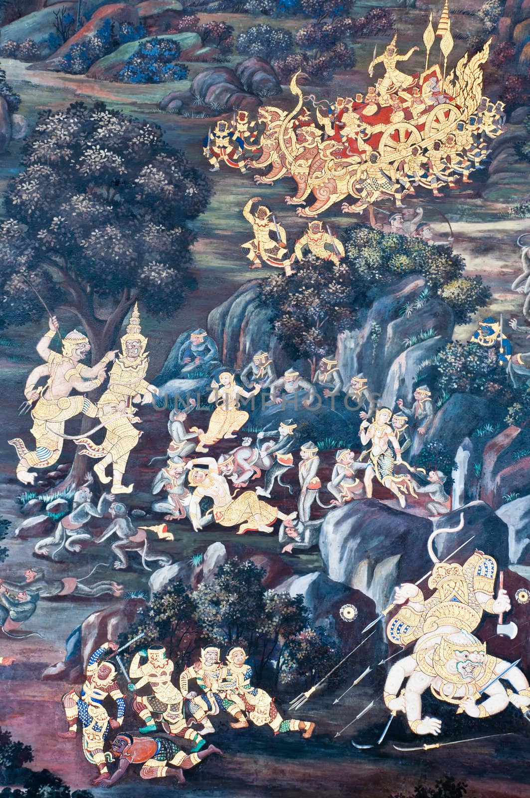 Thai Mural Painting on the wall, Wat Phra Kaew, Bangkok, Thailand (Ramayana story). The temple is created with money donated by people it is public domain and open to the public Visits.