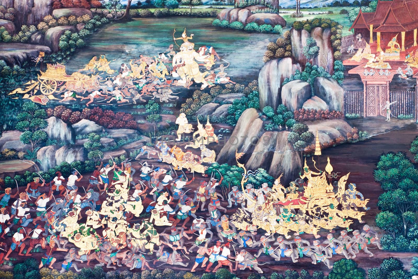 Thai Mural Painting on the wall, Wat Phra Kaew, Bangkok, Thailand (Ramayana story). The temple is created with money donated by people it is public domain and open to the public Visits.