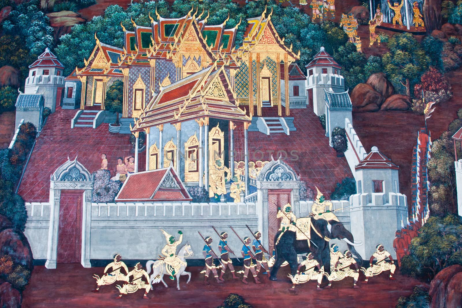 Thai Mural Painting on the wall, Wat Phra Kaew, Bangkok, Thailand (Ramayana story). The temple is created with money donated by people it is public domain and open to the public Visits.