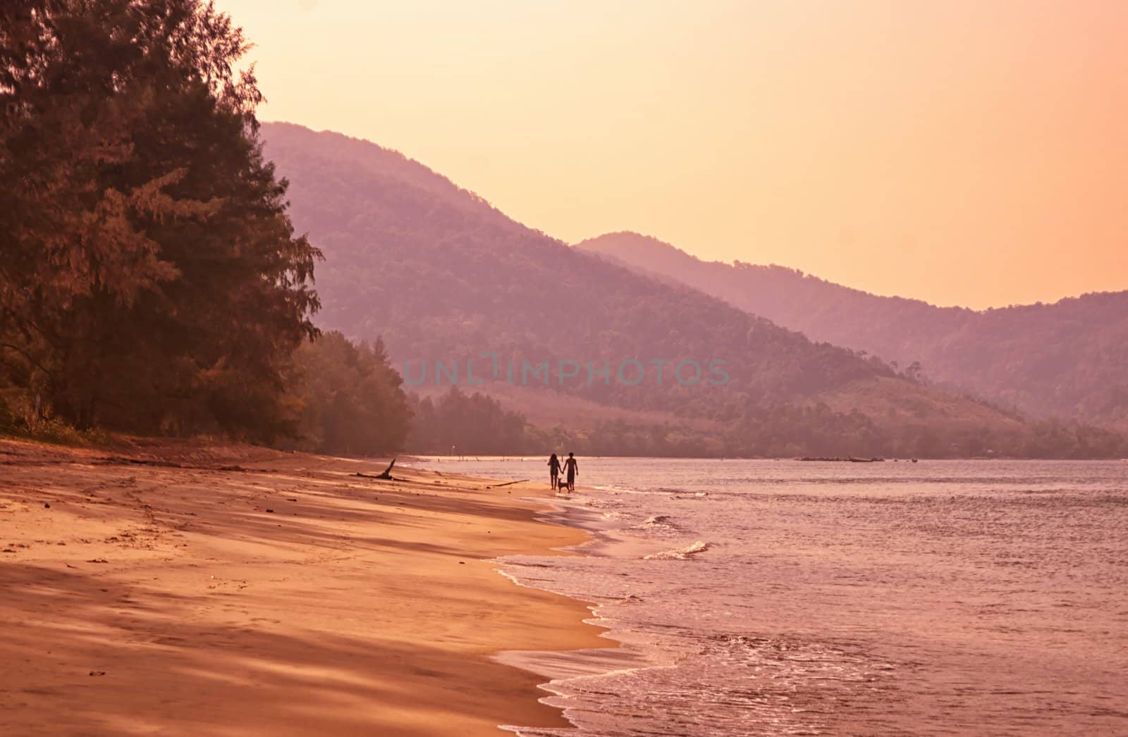 couple on beach by clearviewstock