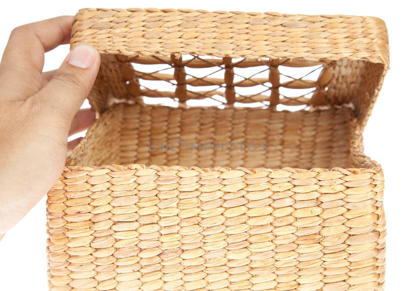 hand open wicker basket isolated on white background