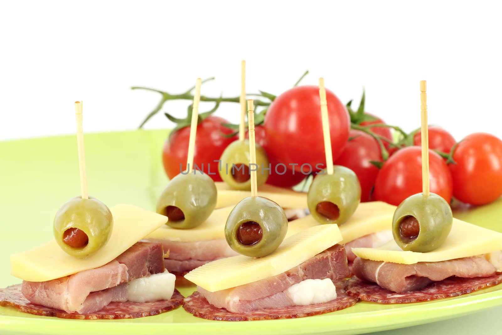 ham cheese olives and tomatoes buffet food by goce