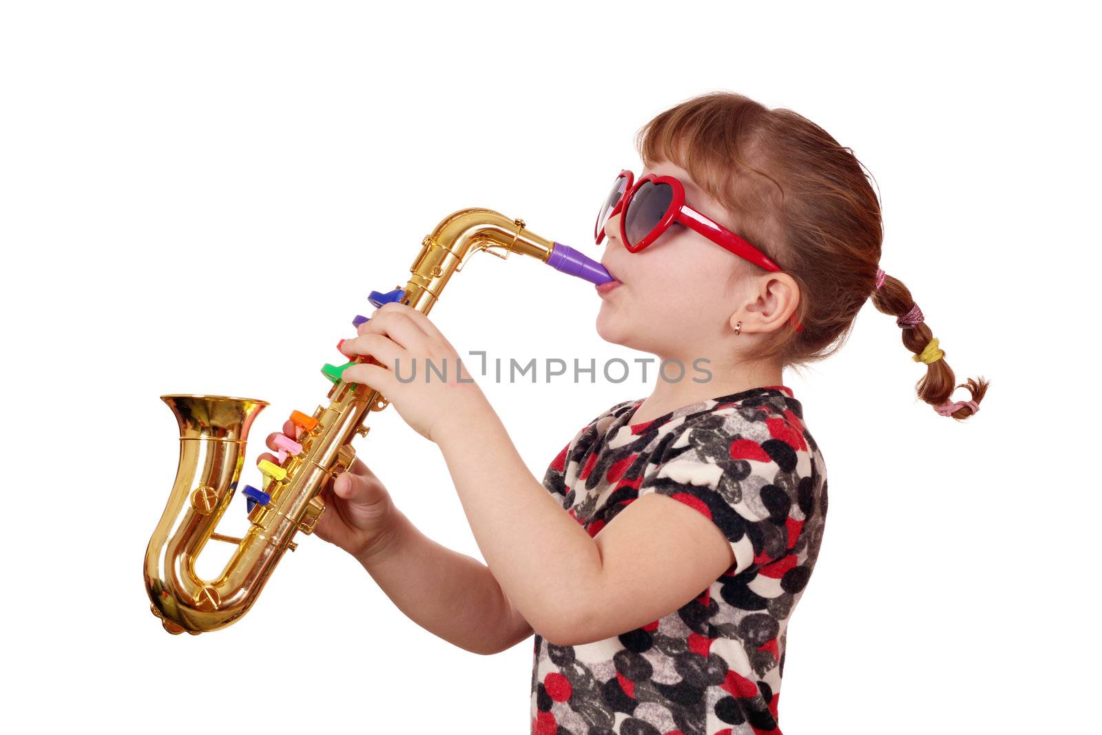 little girl with sunglasses play music on saxophone